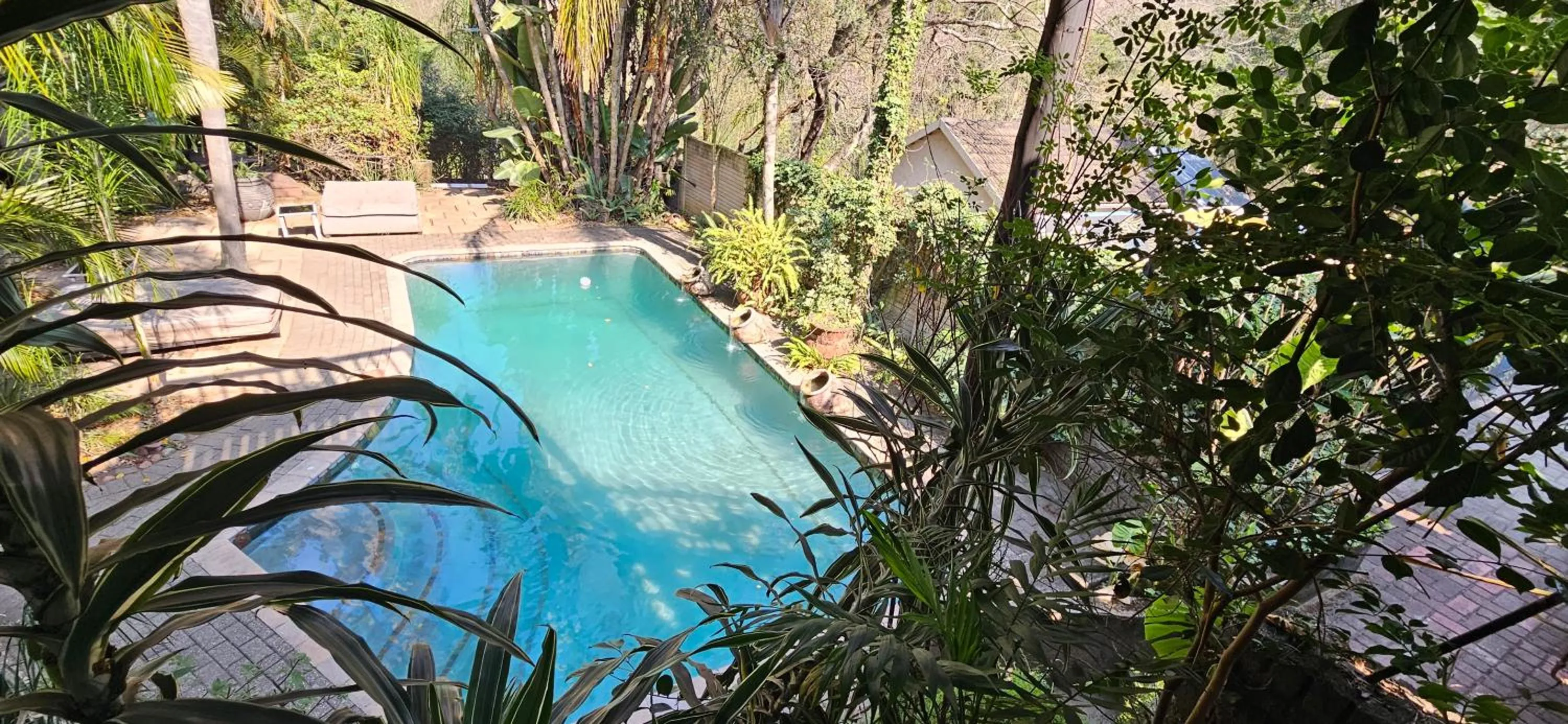 Pool view in Old Vic Travellers Inn Nelspruit