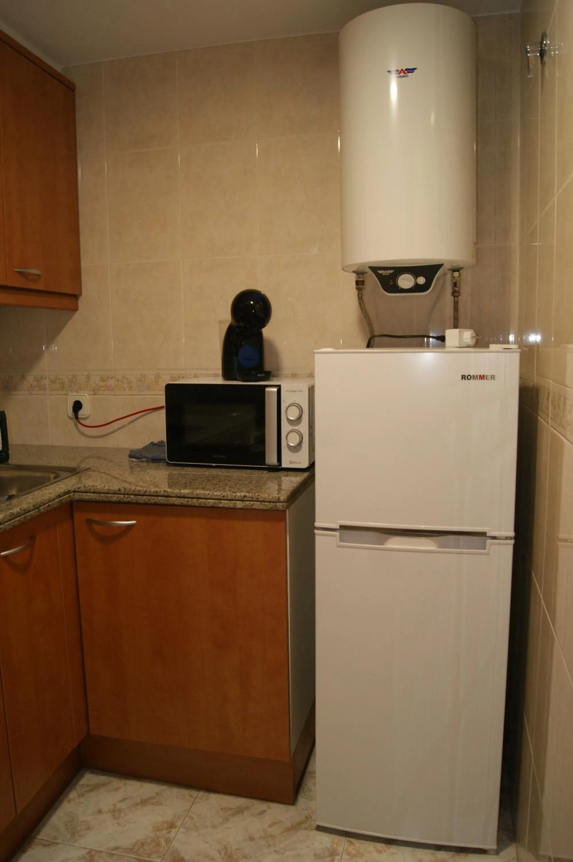 Kitchen or kitchenette in Hostal Santa Clara