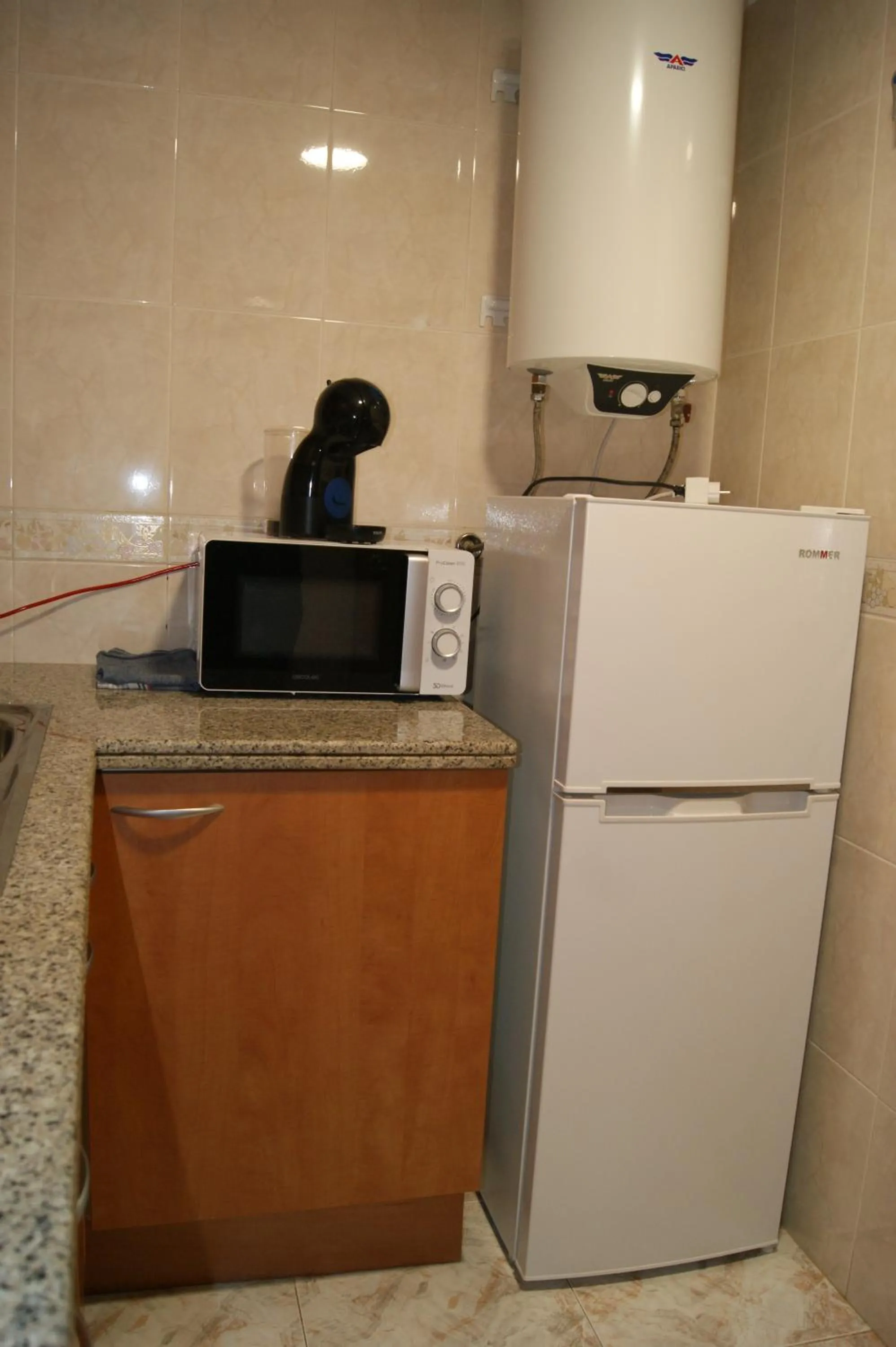 Kitchen or kitchenette in Hostal Santa Clara