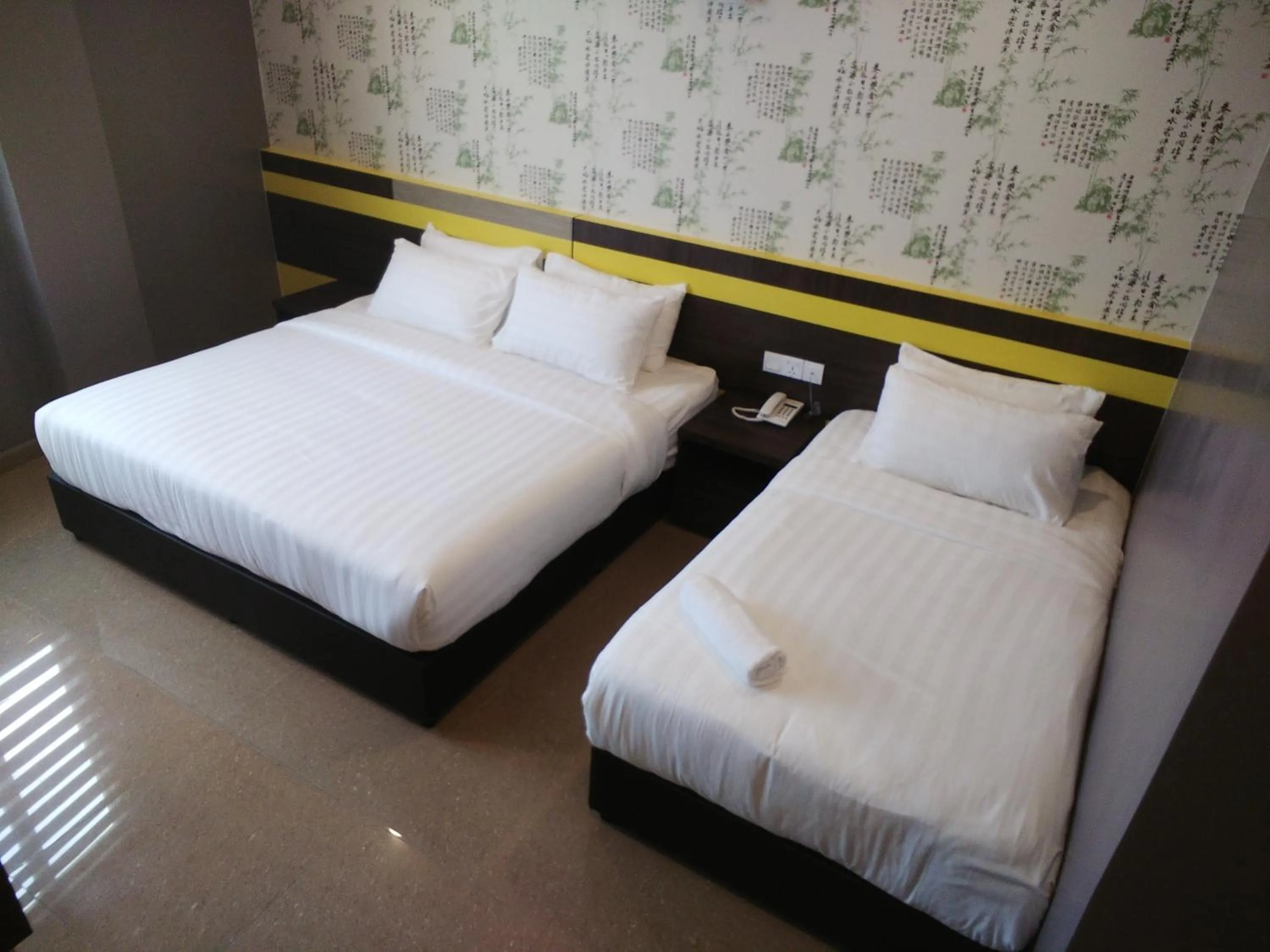 Bed in Kampar Boutique Hotel
