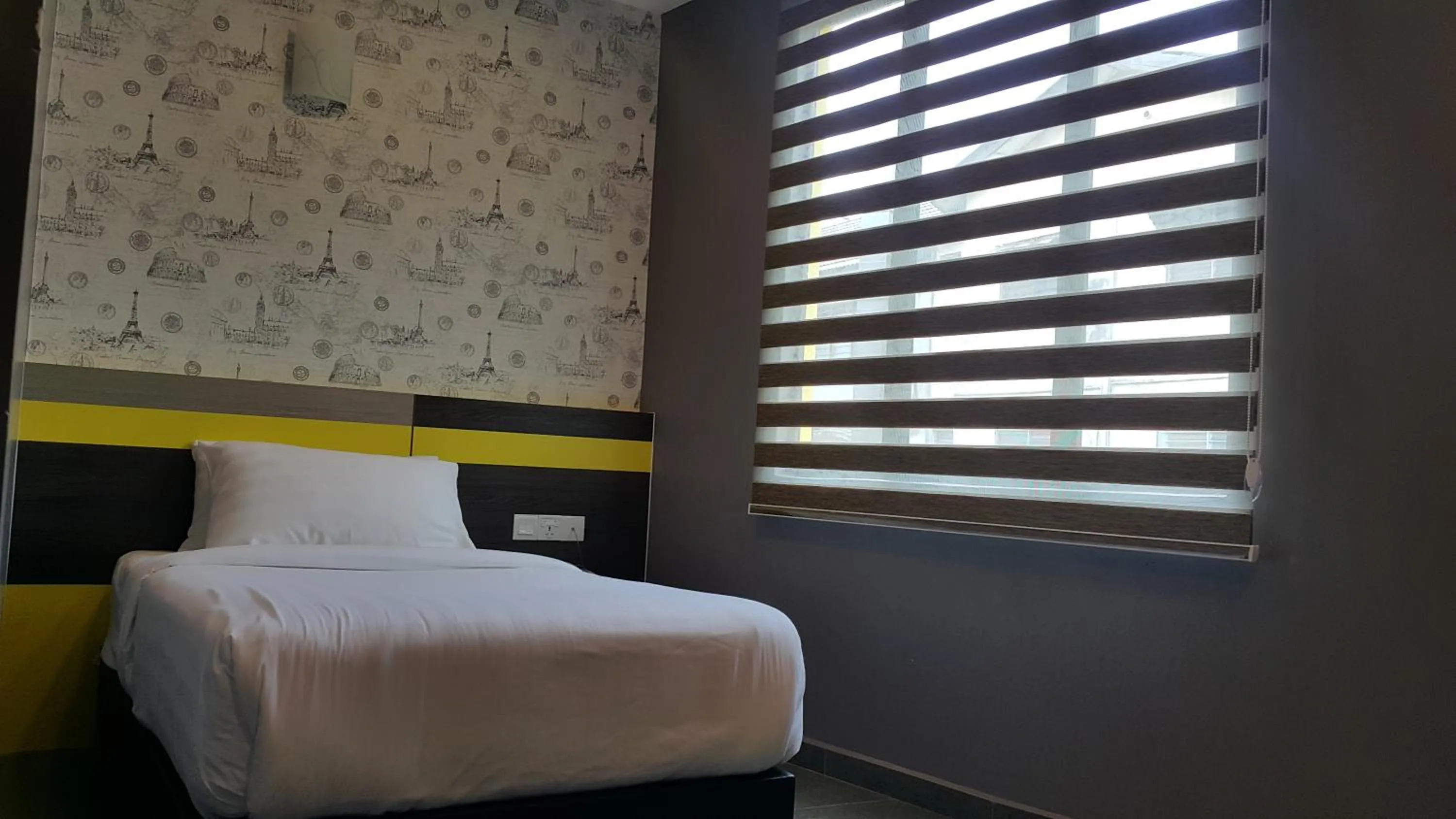 Bed in Kampar Boutique Hotel