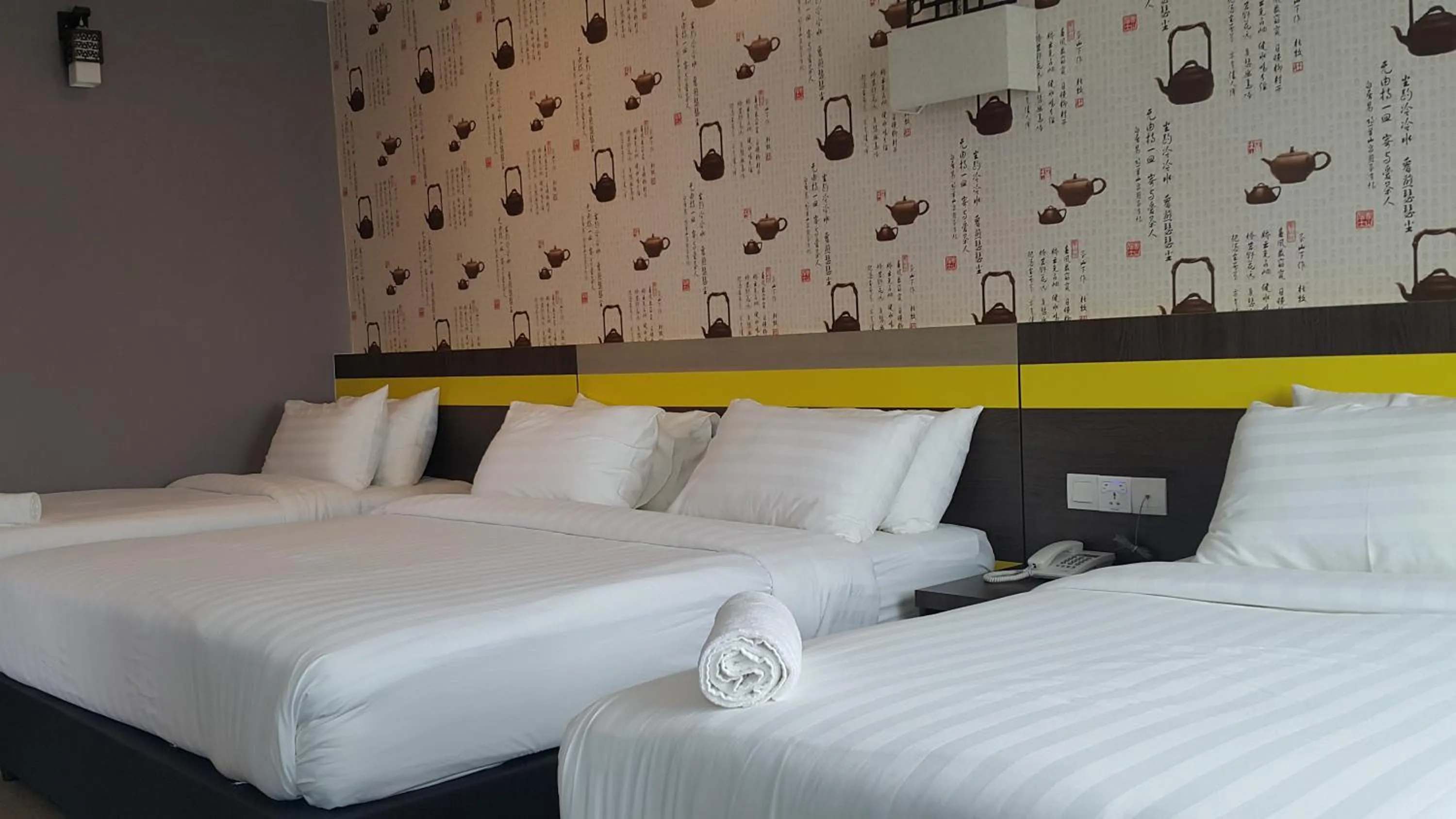 Bed in Kampar Boutique Hotel