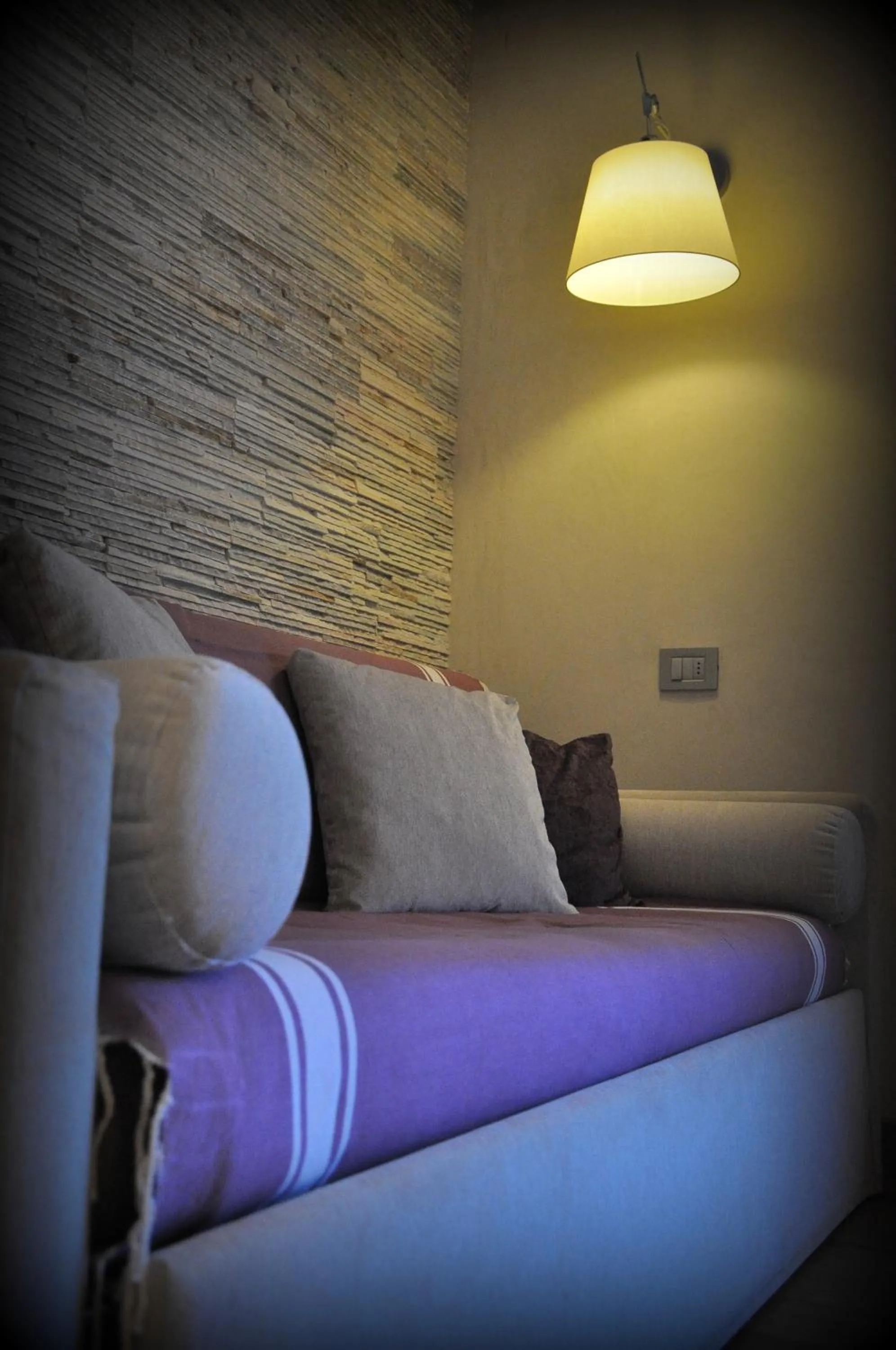 Bed in Sottovento Luxury Hospitality