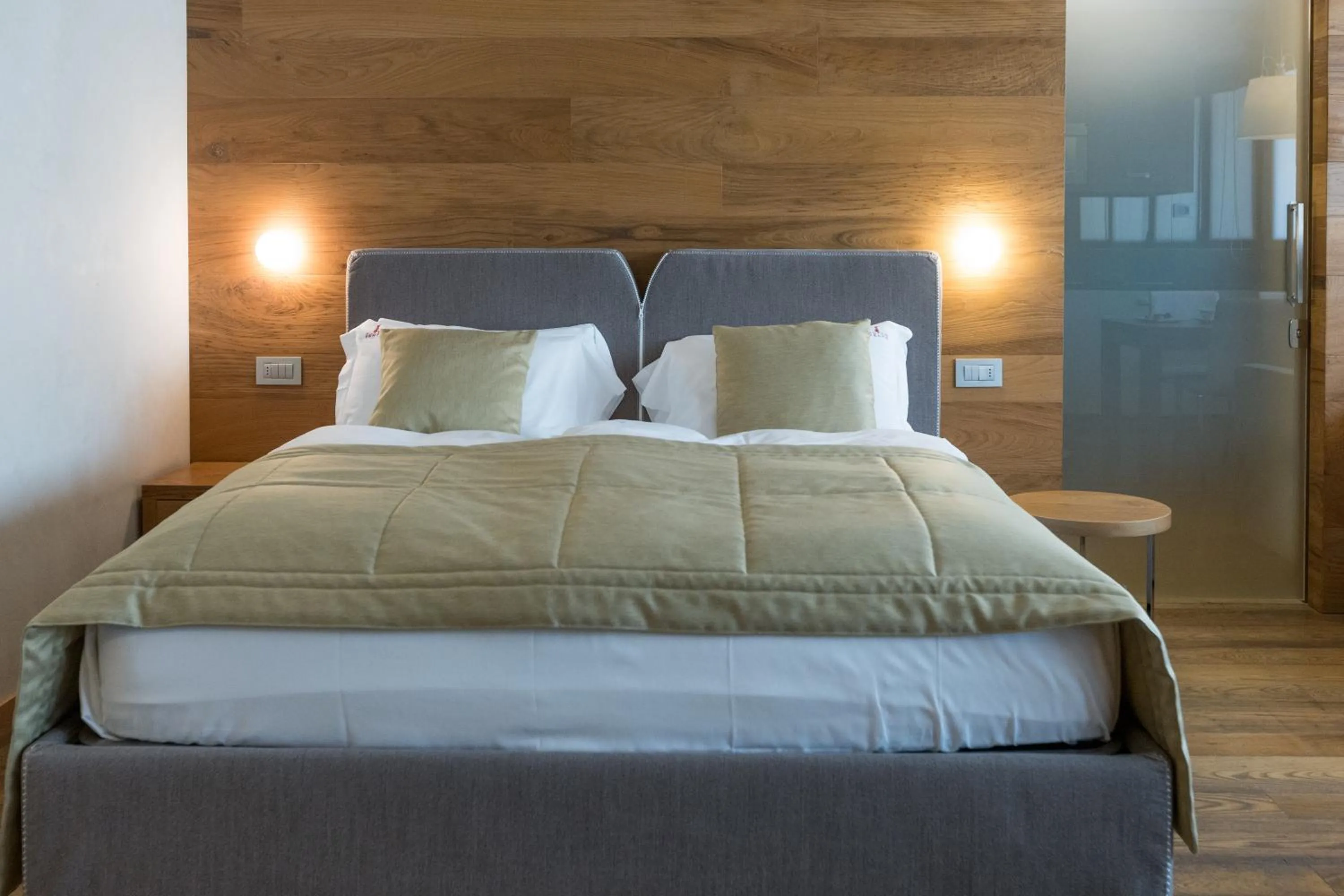 Bed in Sottovento Luxury Hospitality