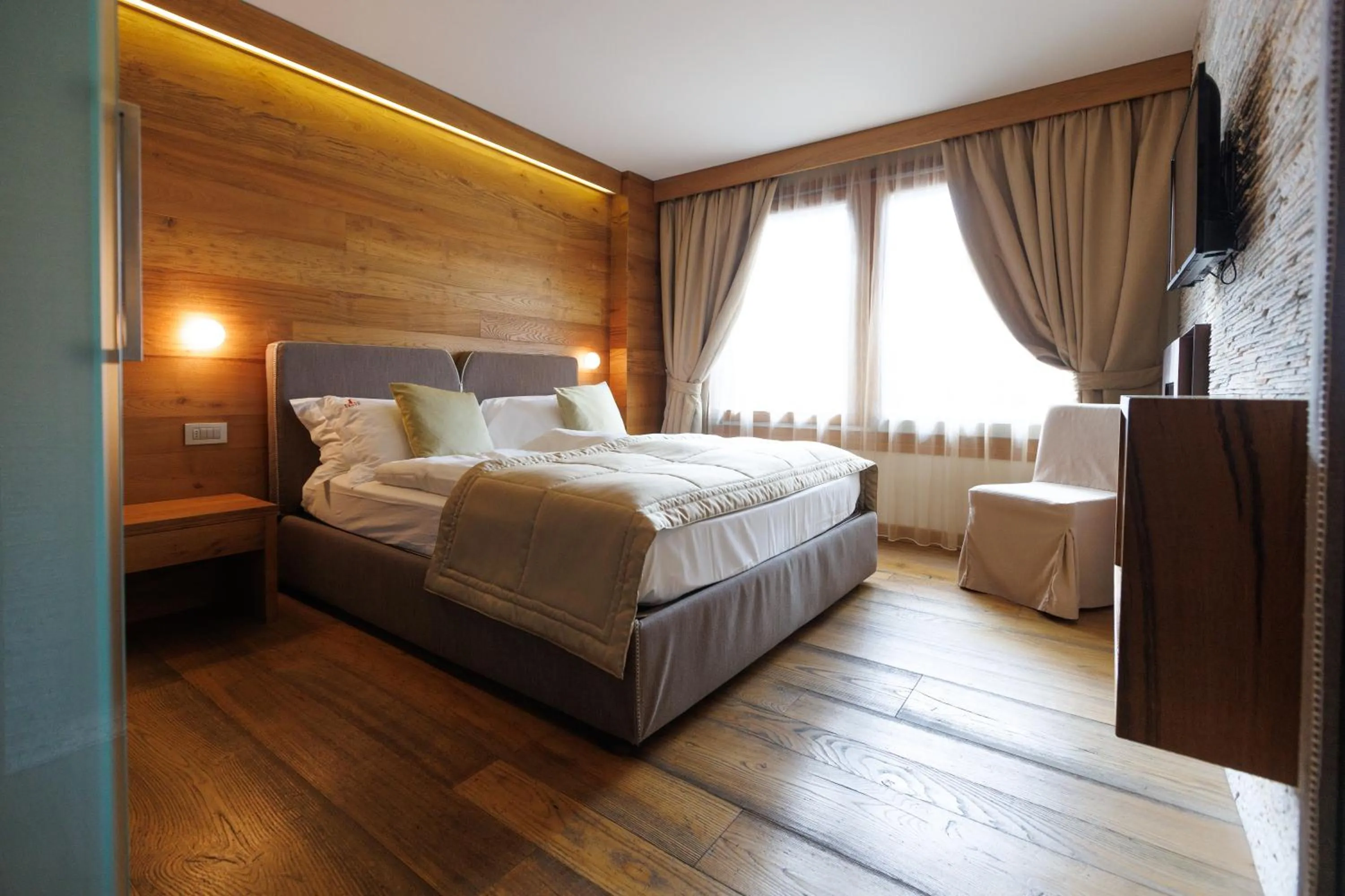 Bed in Sottovento Luxury Hospitality