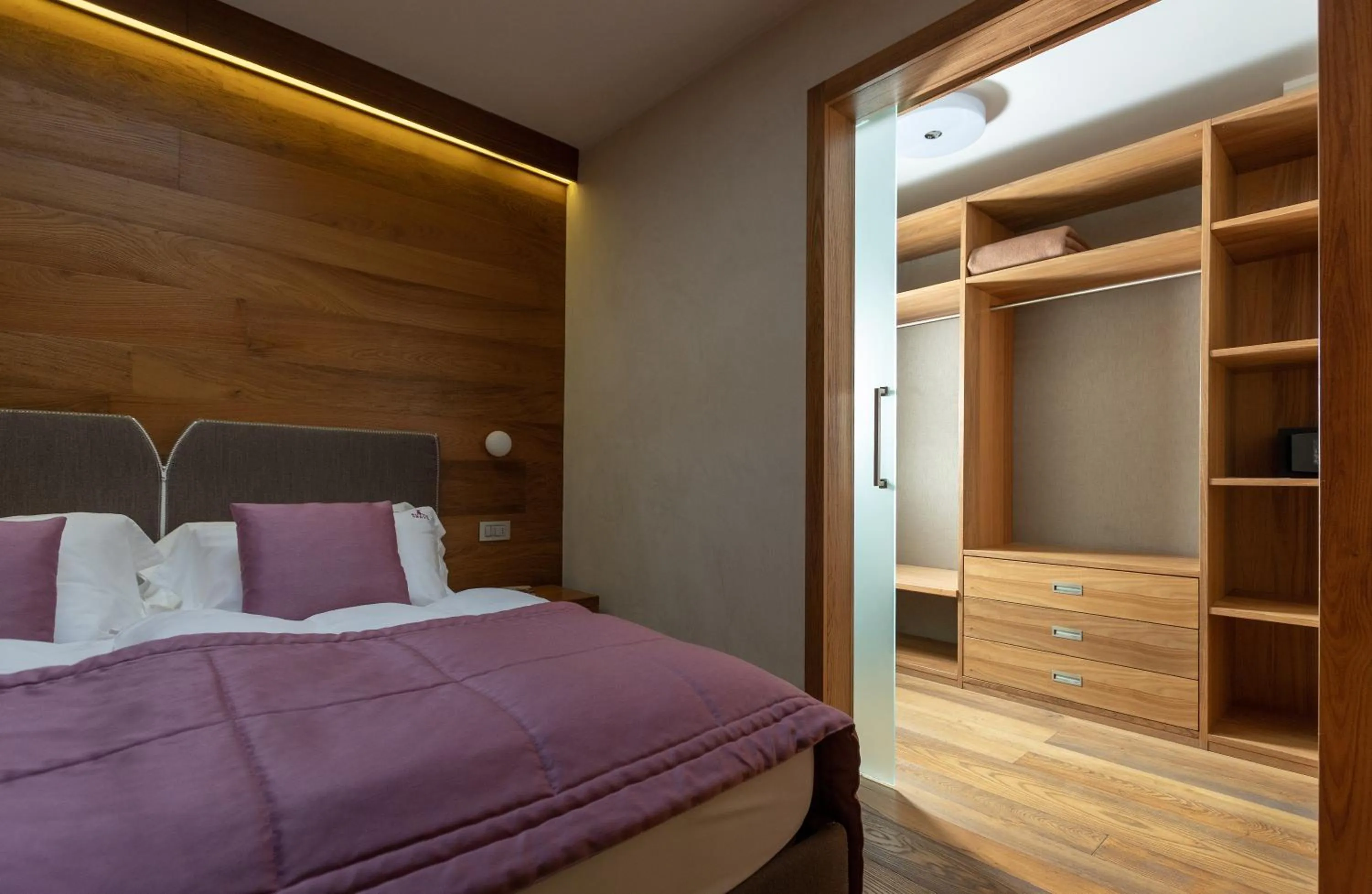 Bed in Sottovento Luxury Hospitality