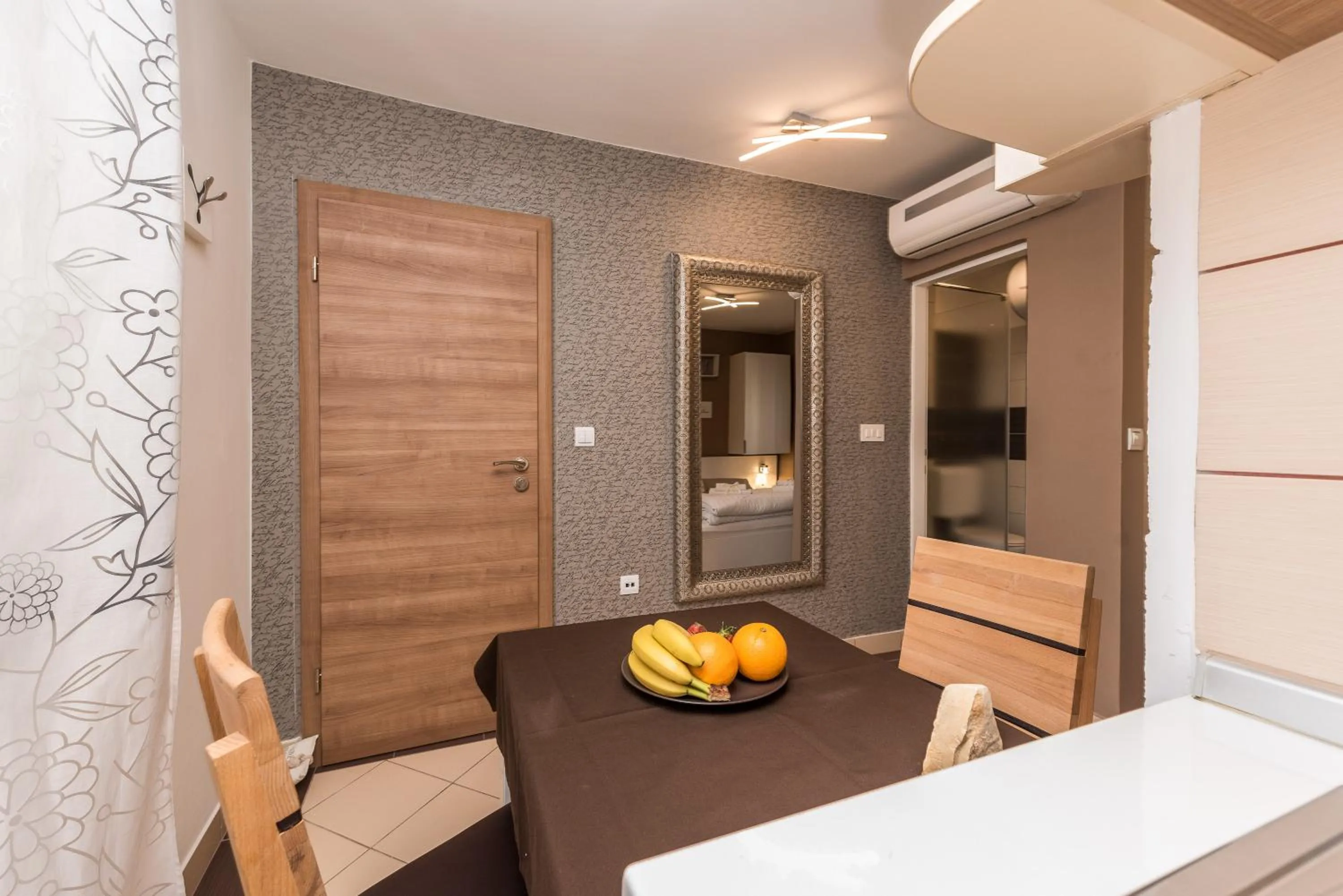 Kitchen or kitchenette, Bed in Apartments Donat
