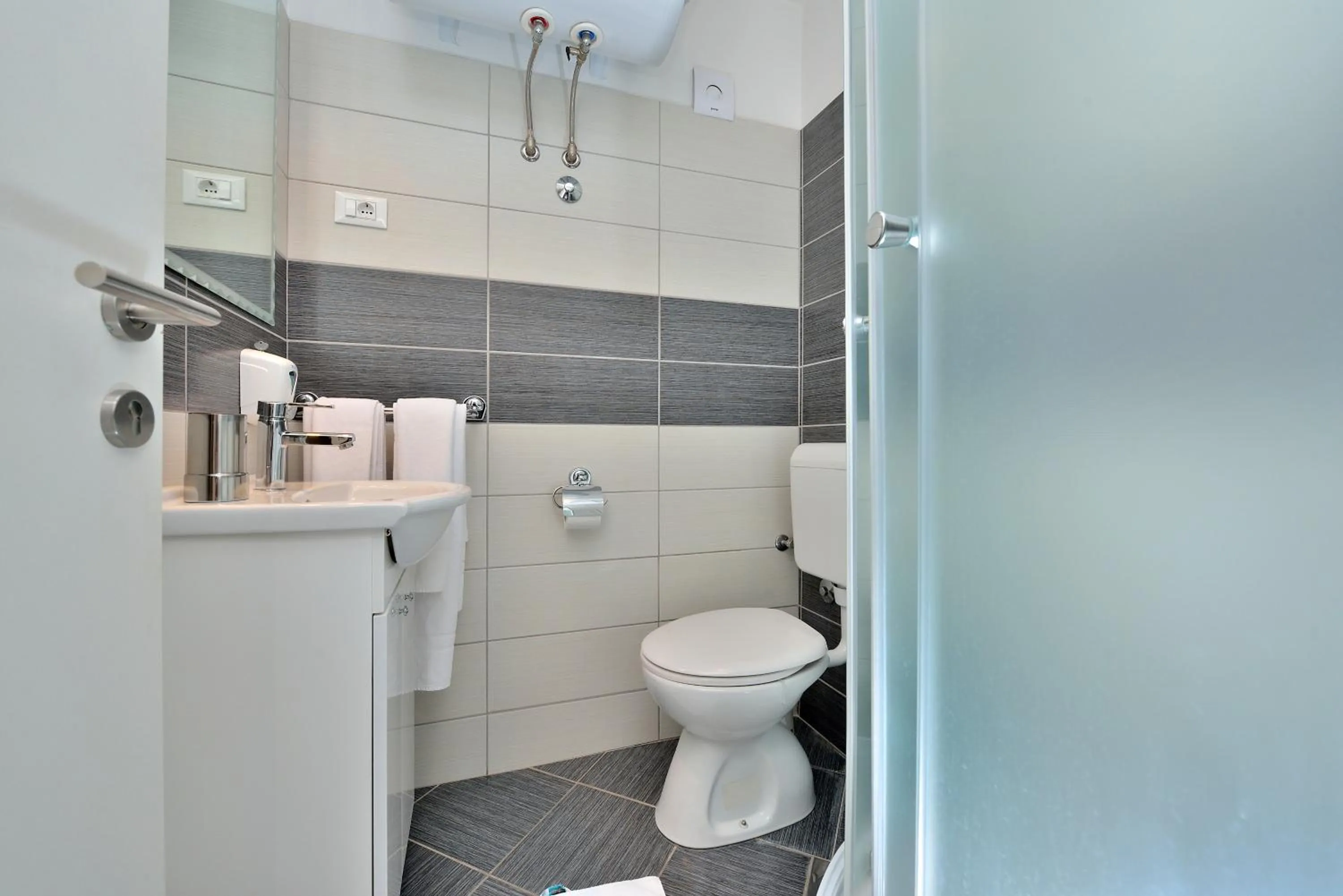 Bathroom in Apartments Donat