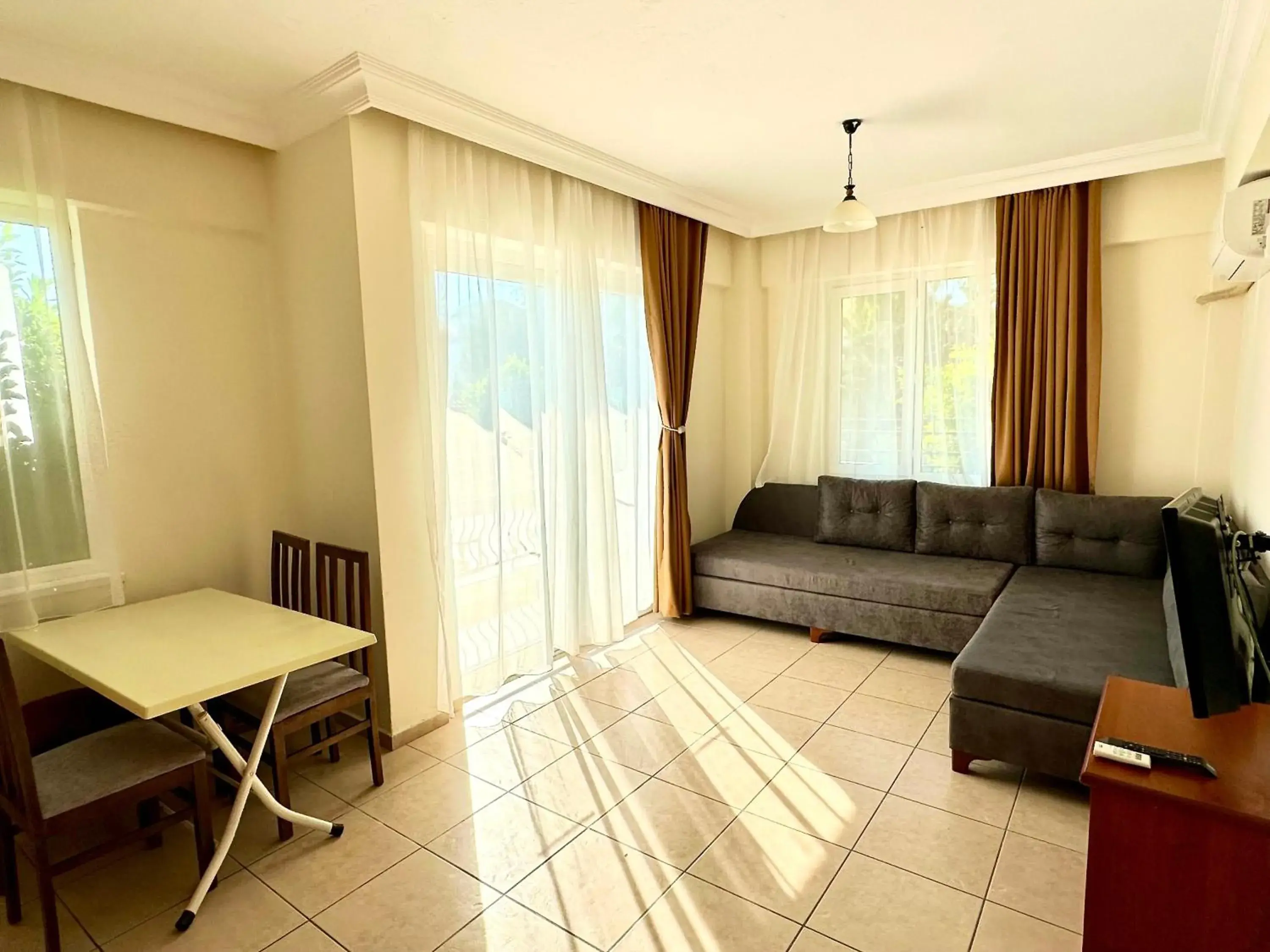 Living room in Melissa Garden Apart Hotel Living room in Melissa Garden Apart Hotel