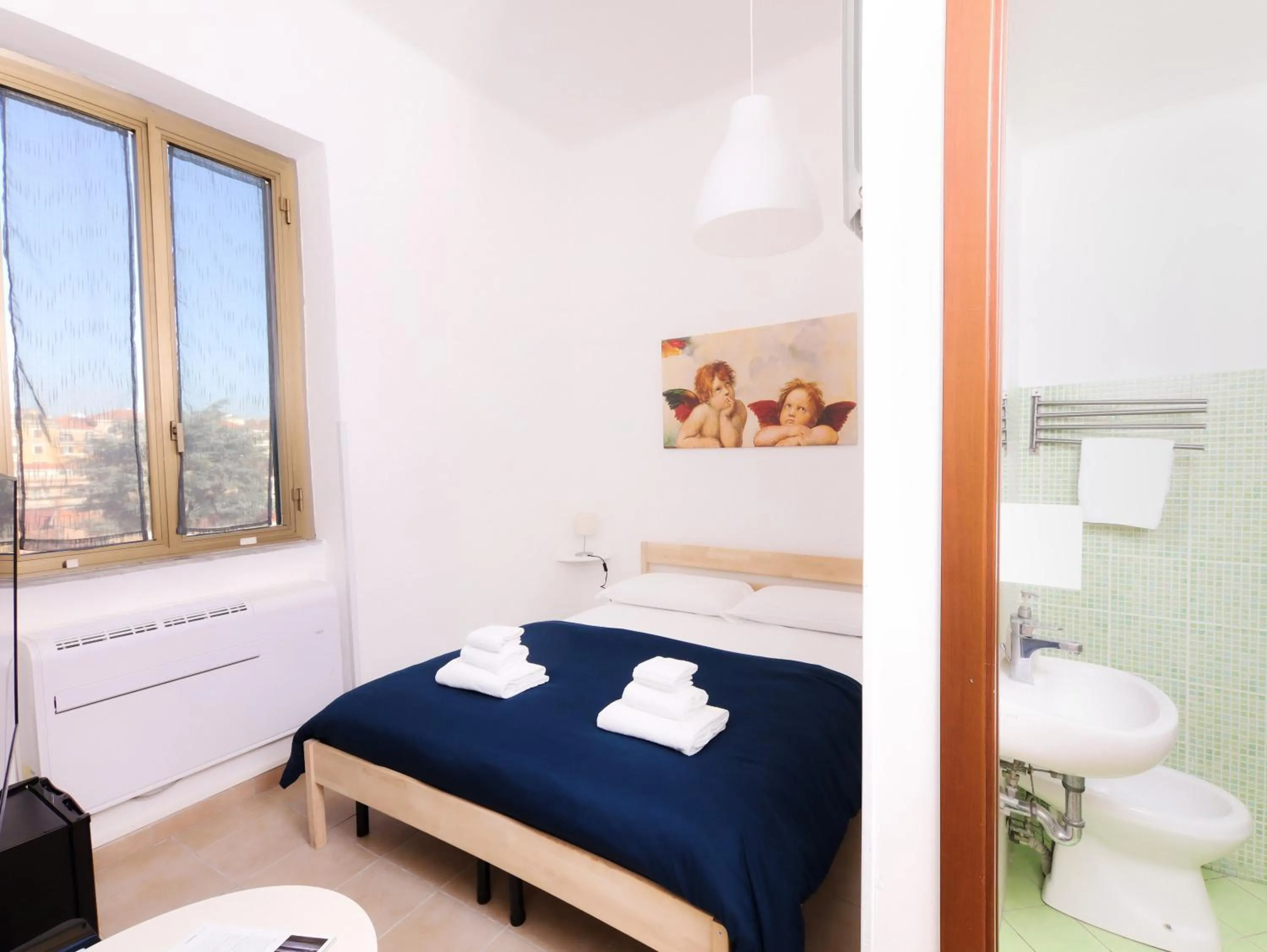 Bed in Cielo Vaticano Guest House