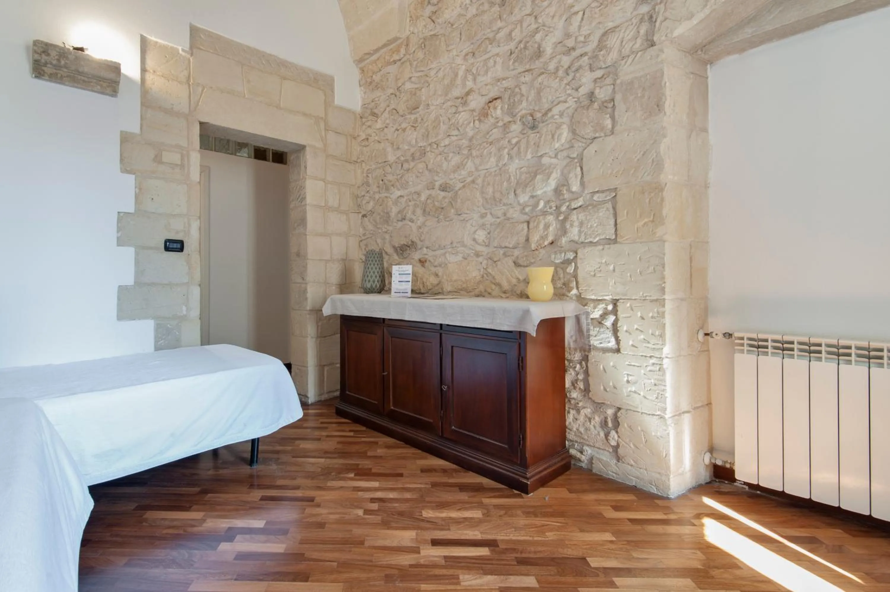 Photo of the whole room, Bed in Chiesa Greca Suites - Lecce Selection