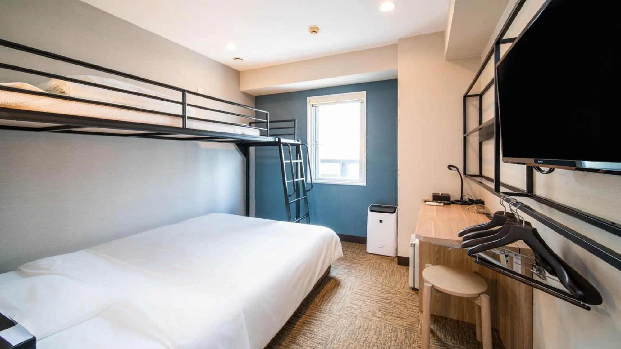 Bed in Super Hotel Naha Shintoshin