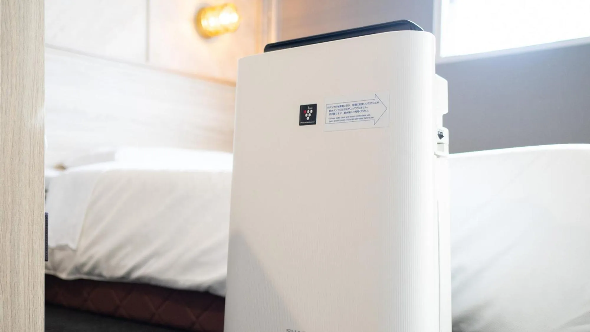 Bed in Super Hotel Naha Shintoshin