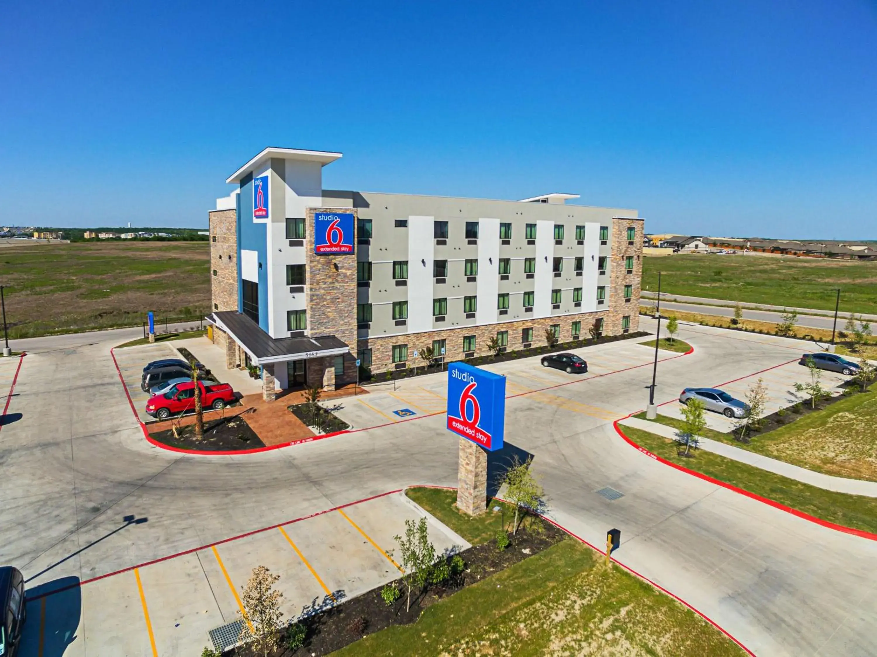 Property building in Studio 6-Buda, TX Property building in Studio 6-Buda, TX