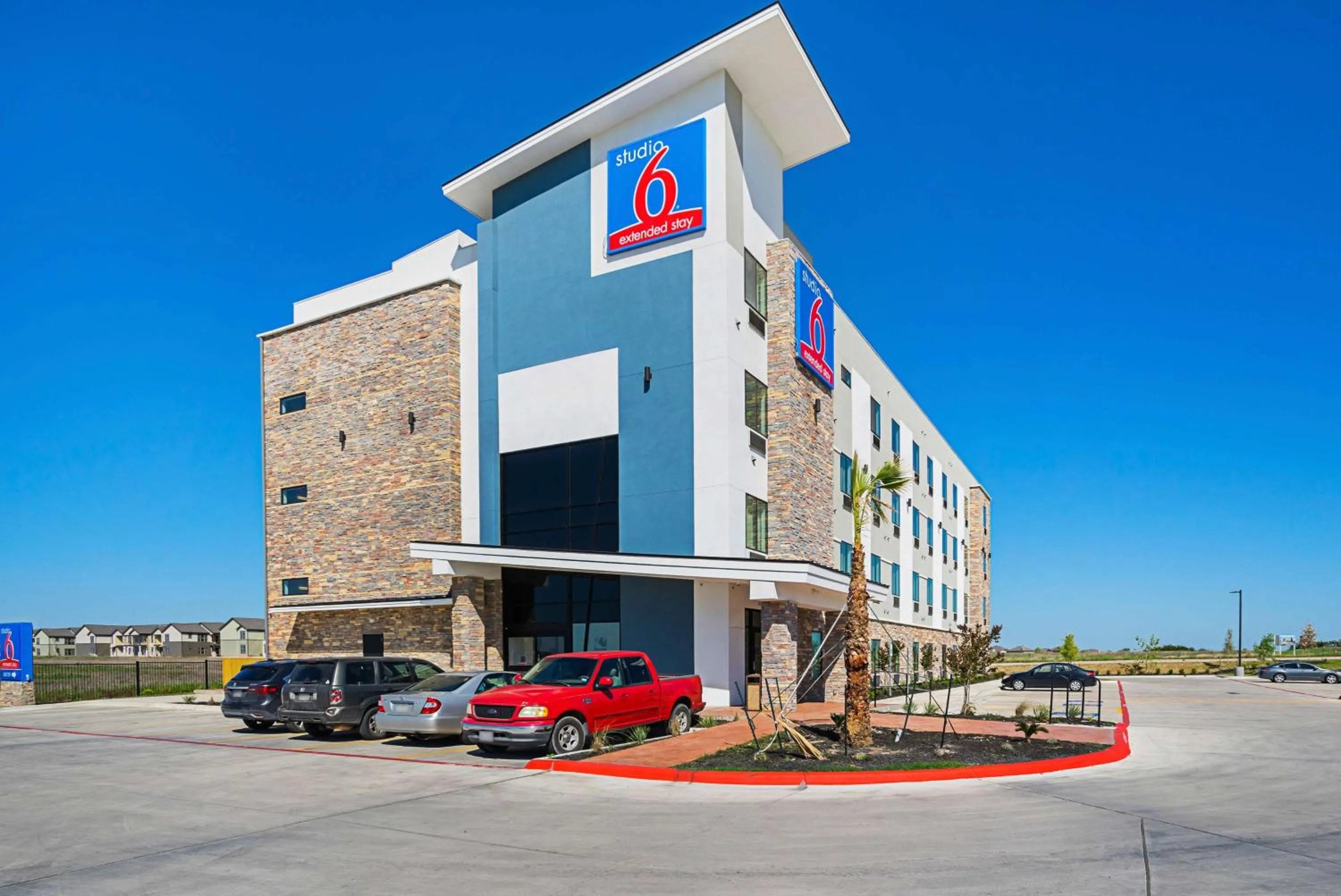 Property building in Studio 6-Buda, TX