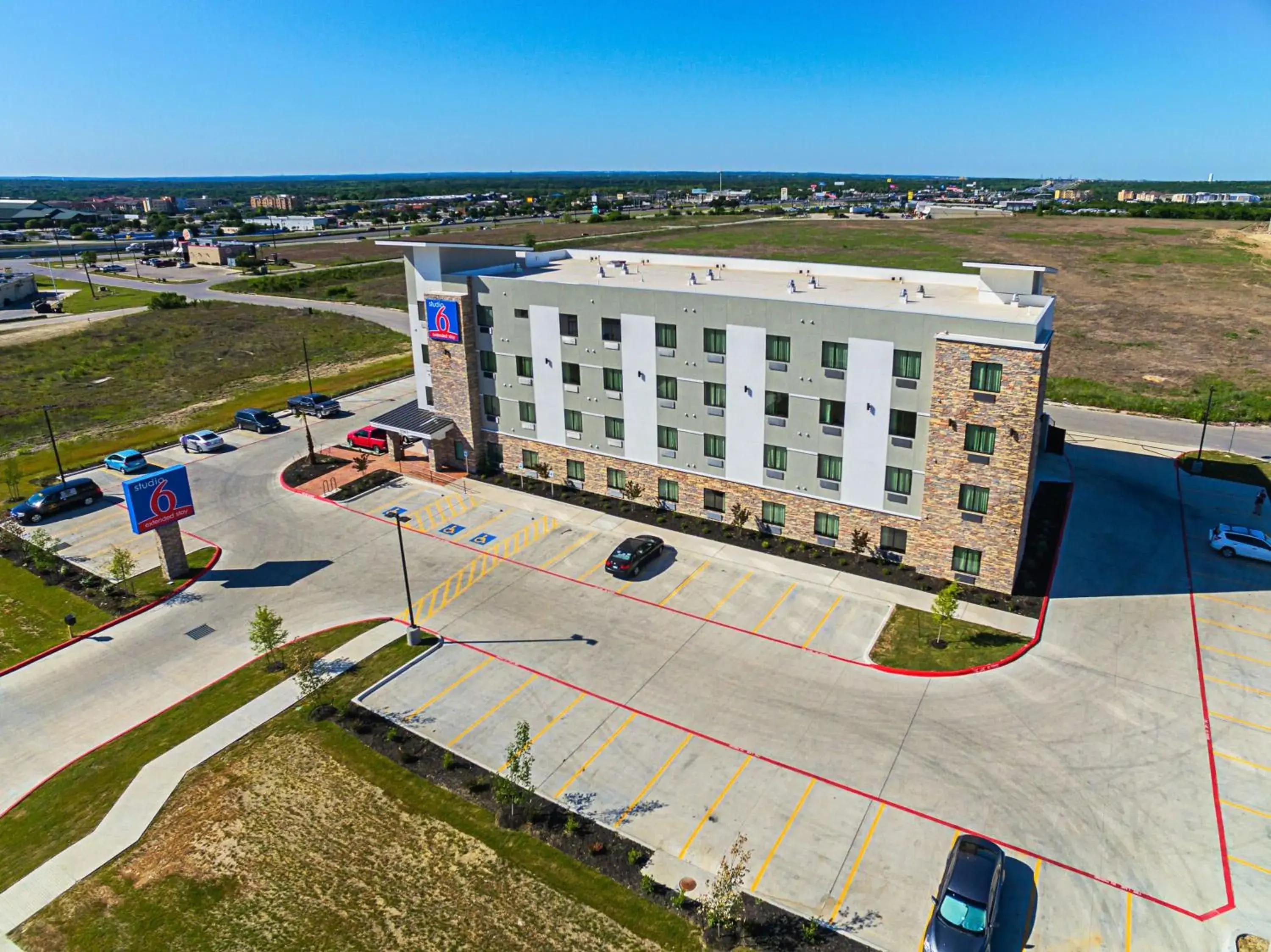 Property building in Studio 6-Buda, TX Property building in Studio 6-Buda, TX