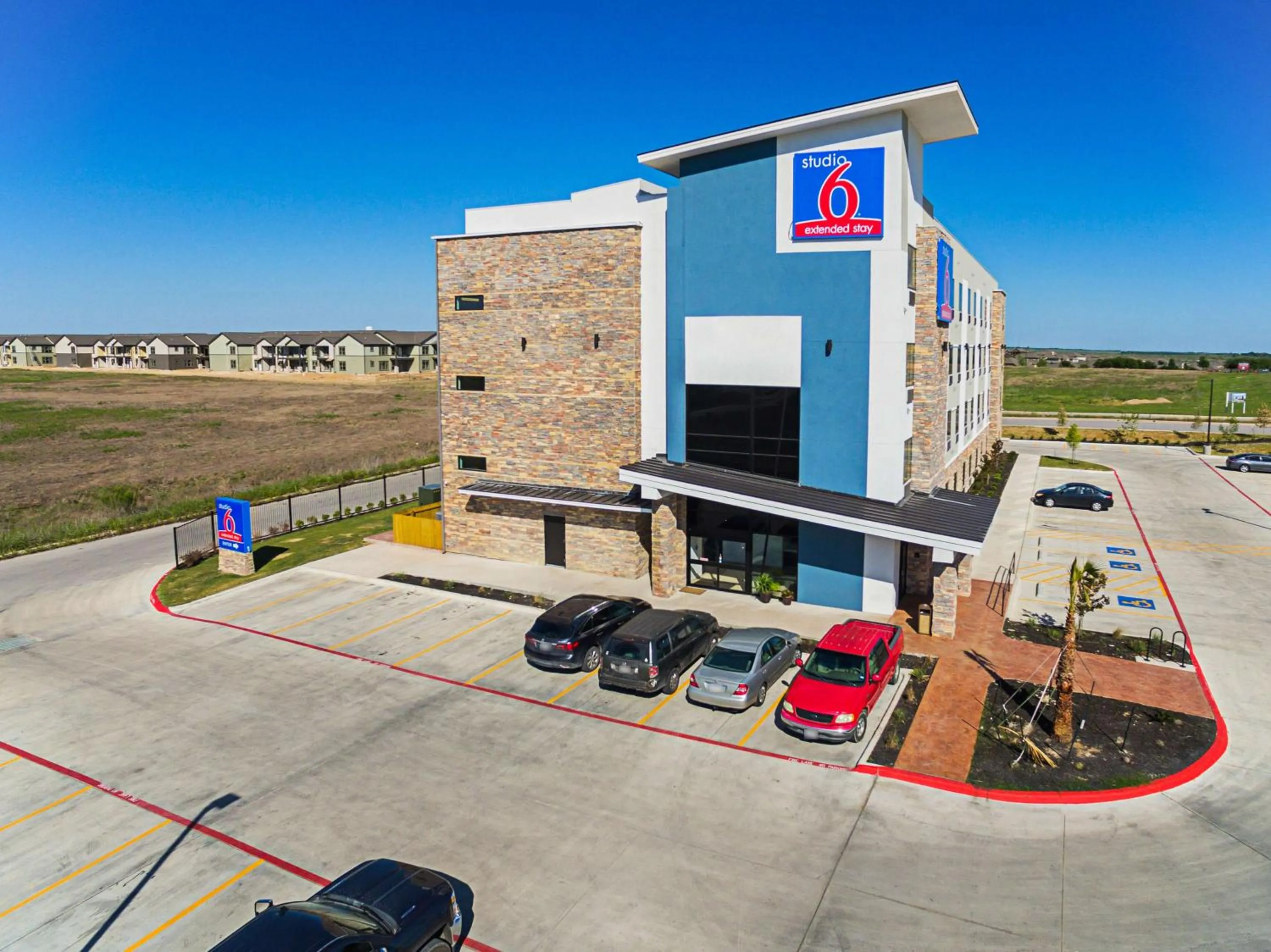 Property building in Studio 6-Buda, TX