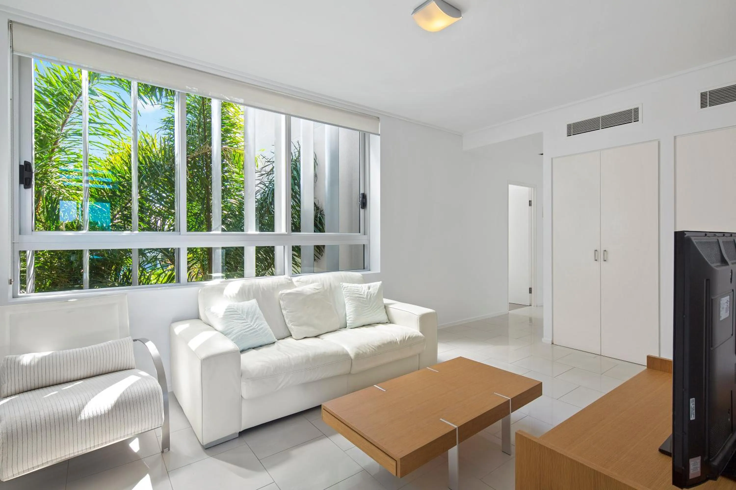 Living room in Peninsula Airlie Beach