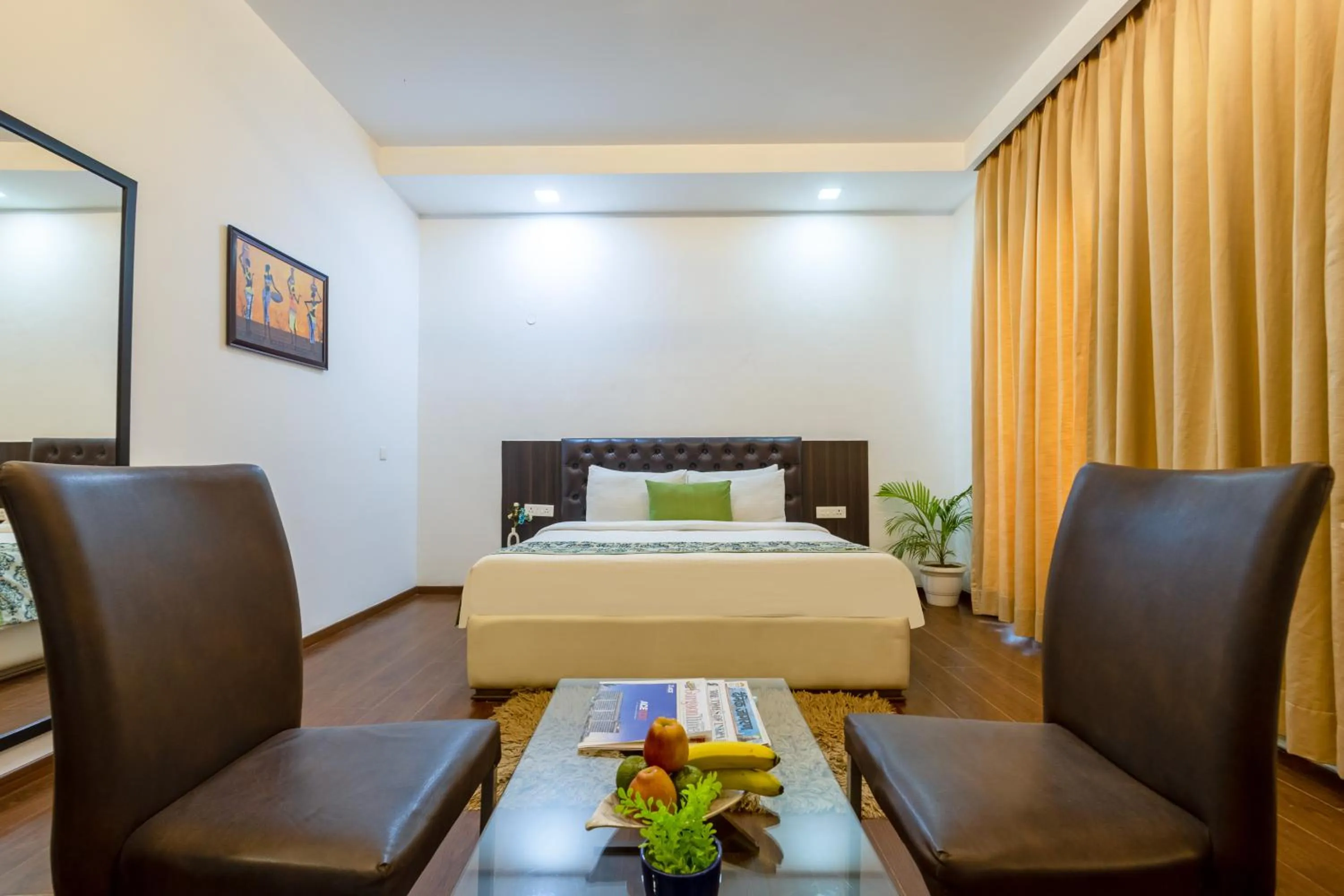 Seating area, Bed in Vivid Boutique Hotel, Medanta, Gurugram