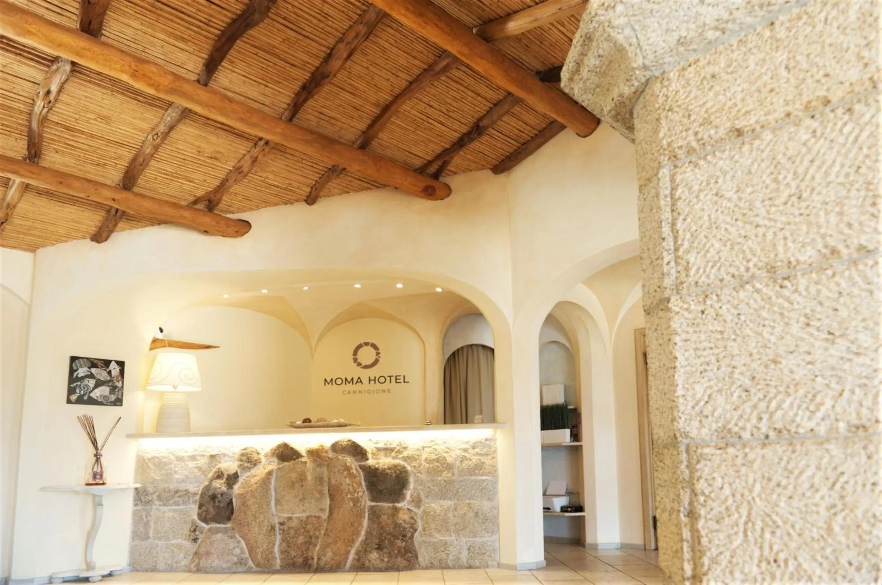 Lobby or reception in Moma Hotel Cannigione Lobby or reception in Moma Hotel Cannigione