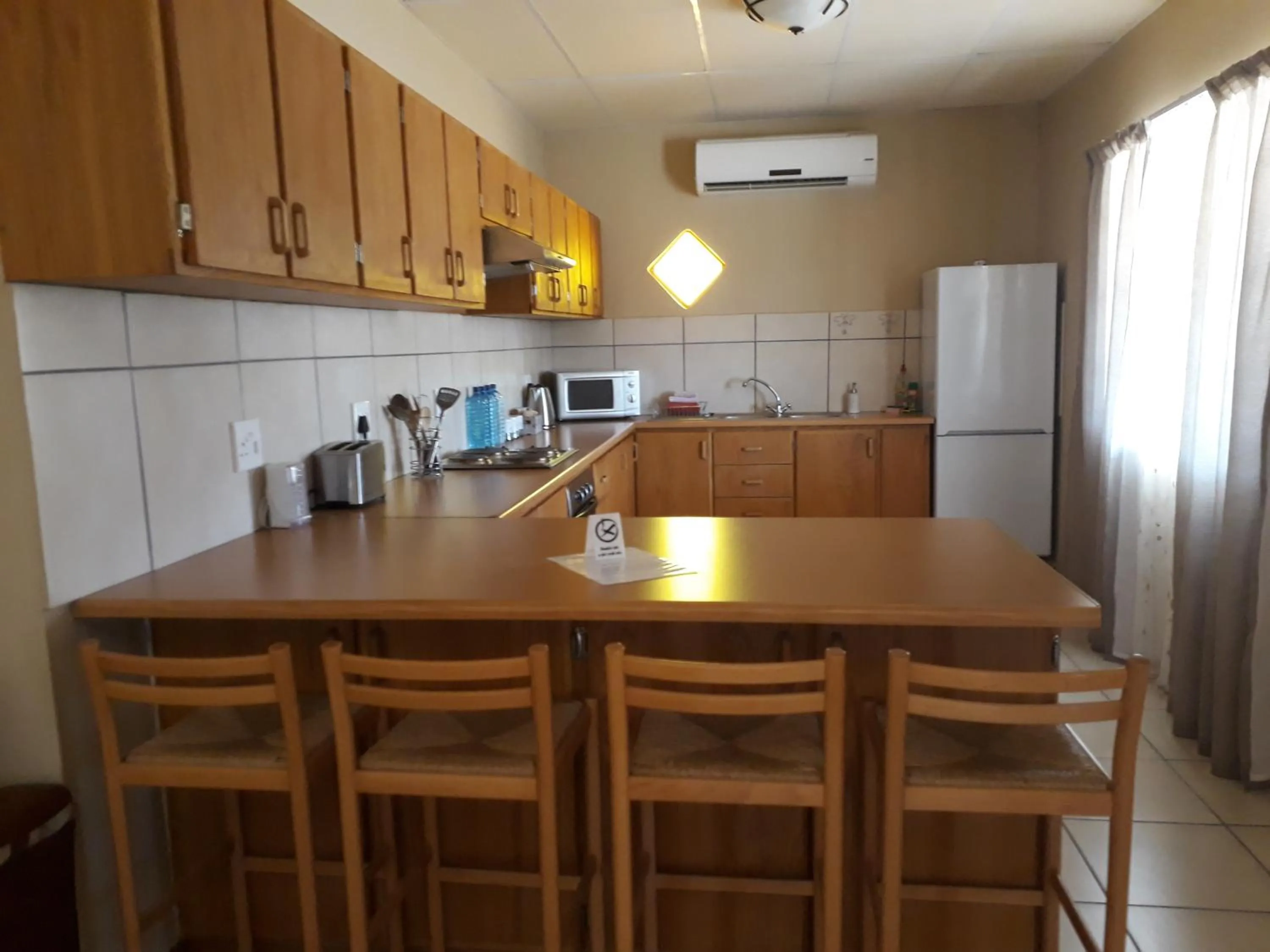 Kitchen or kitchenette in Augrabies De Oude Stoor Guesthouse