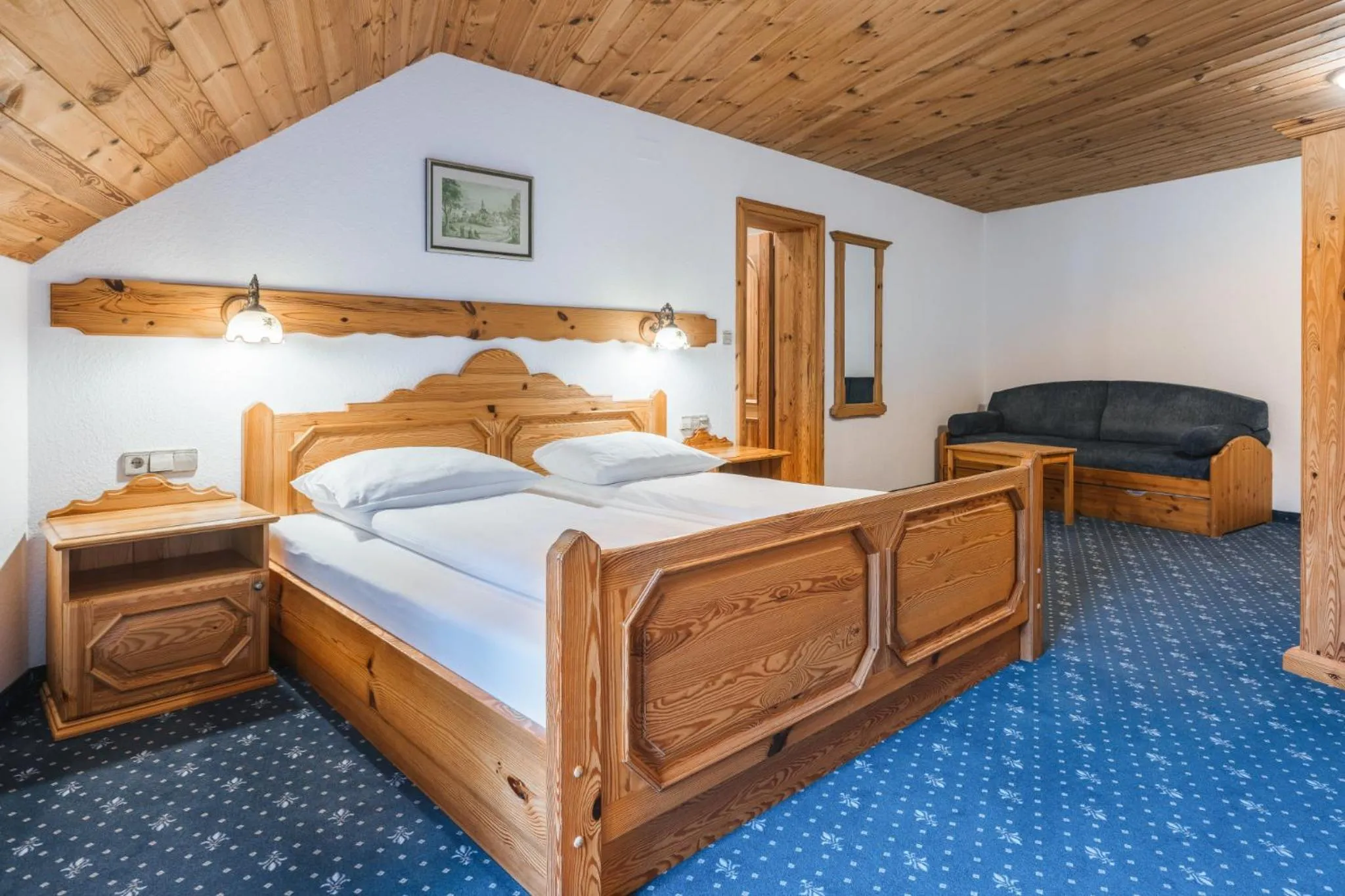 Bed in Garni Hotel Berc