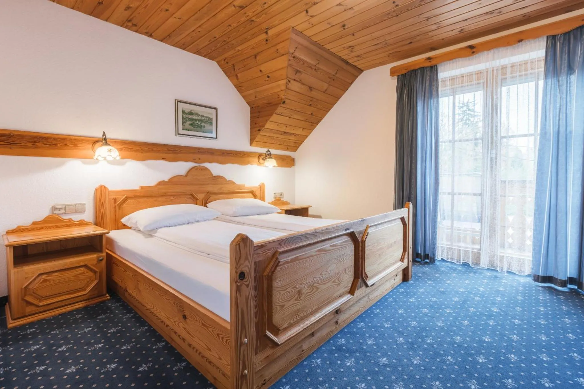 Bed in Garni Hotel Berc