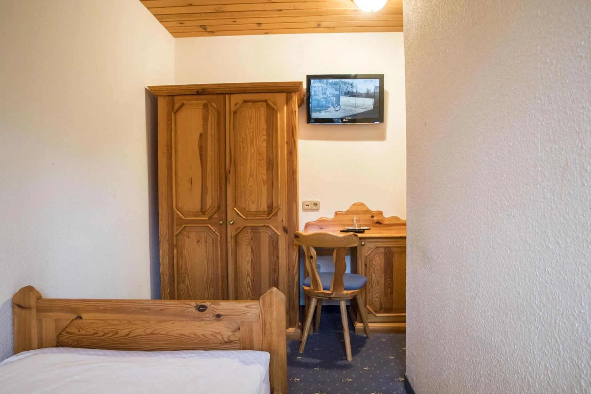 Bed in Garni Hotel Berc