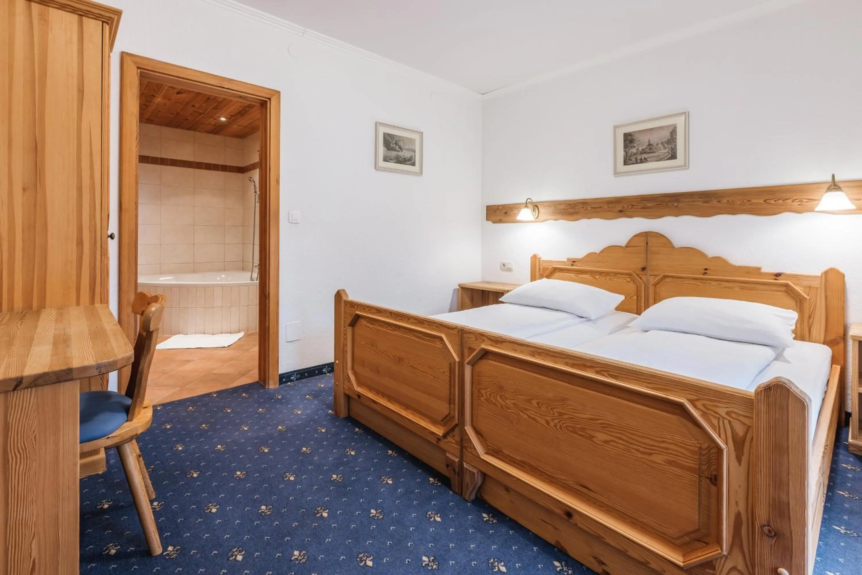 Bed in Garni Hotel Berc