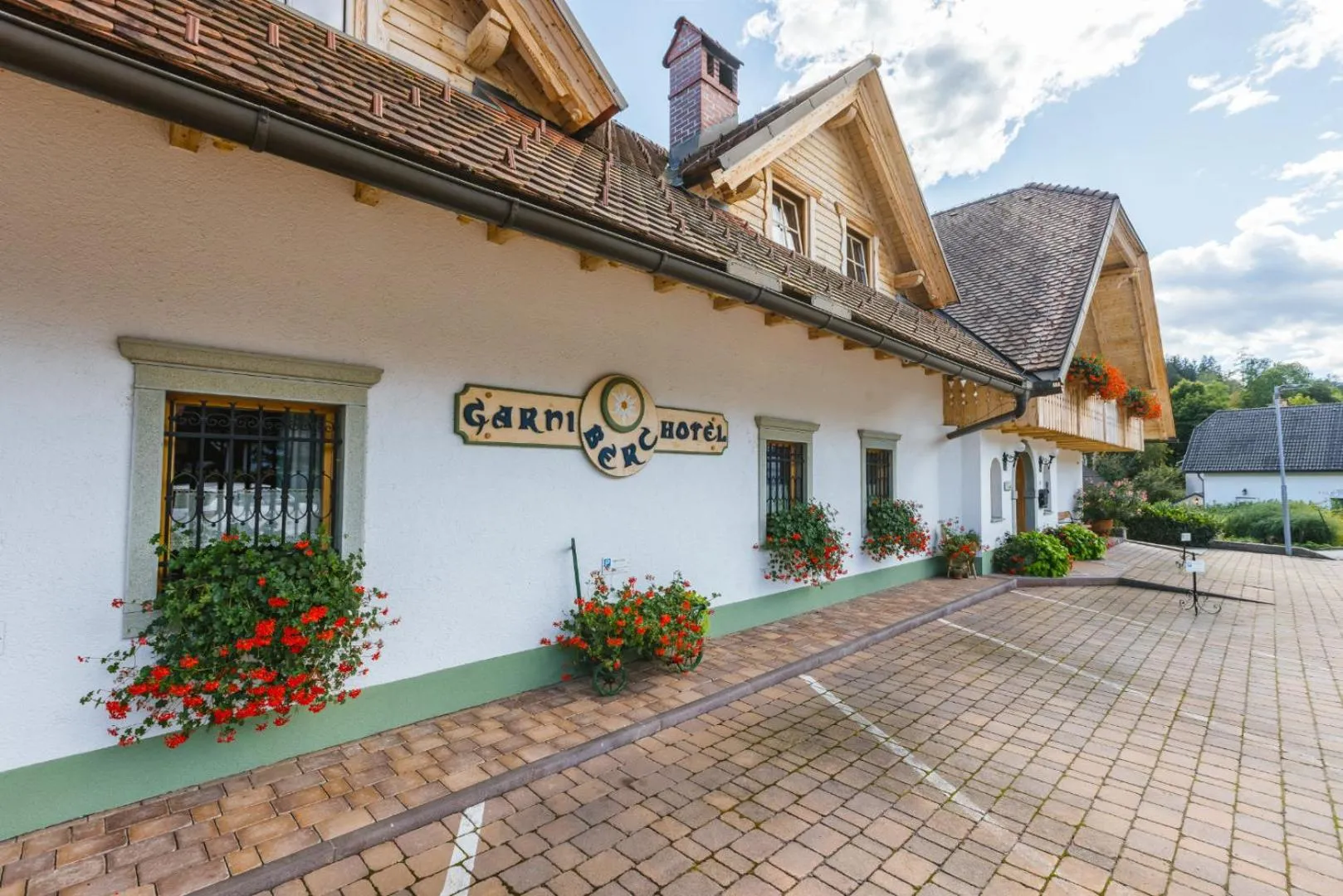 Property logo or sign in Garni Hotel Berc