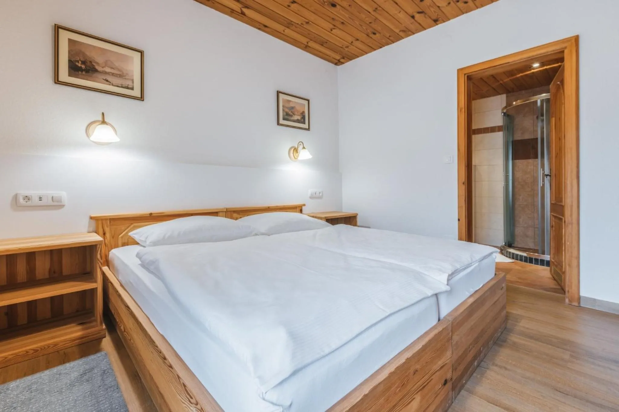 Bed in Garni Hotel Berc