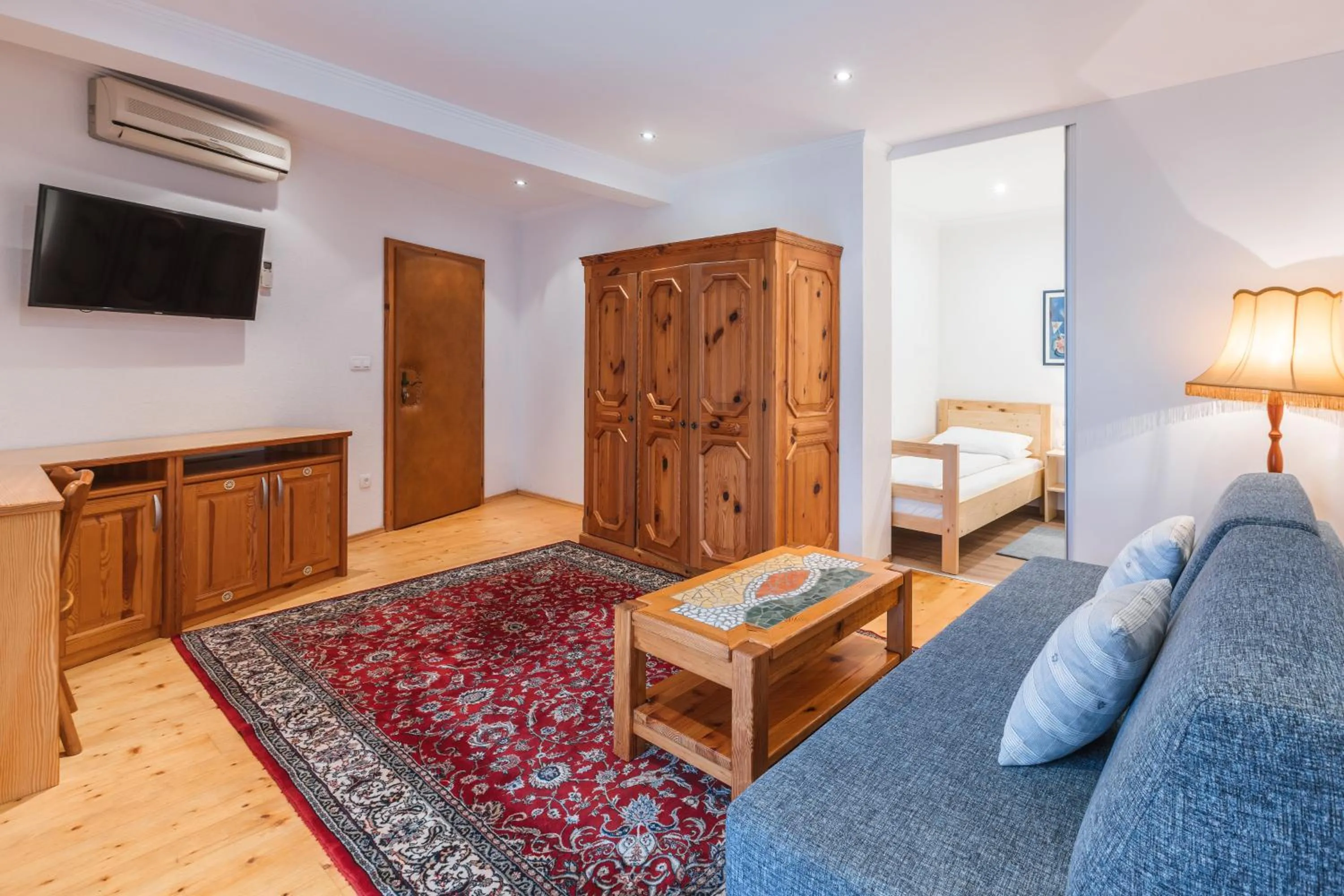 Living room, Bed in Garni Hotel Berc