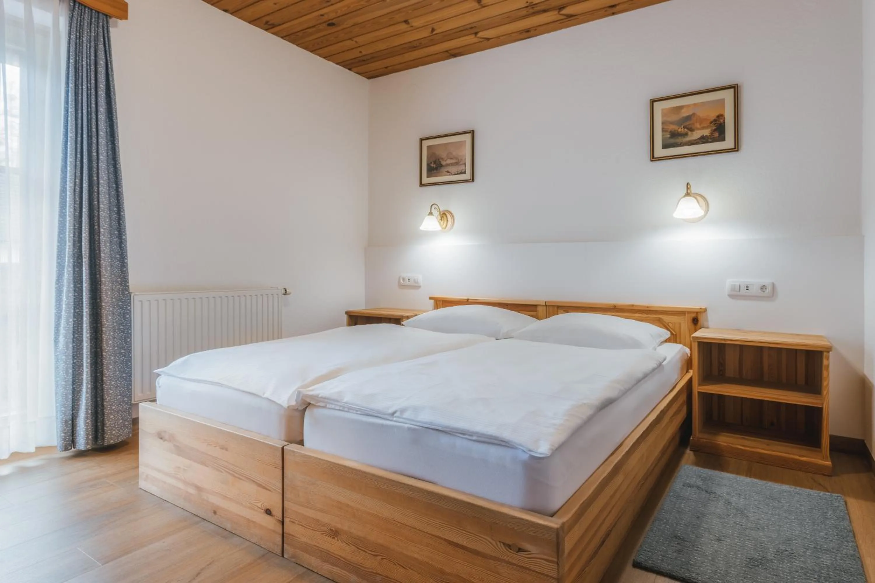 Bed in Garni Hotel Berc
