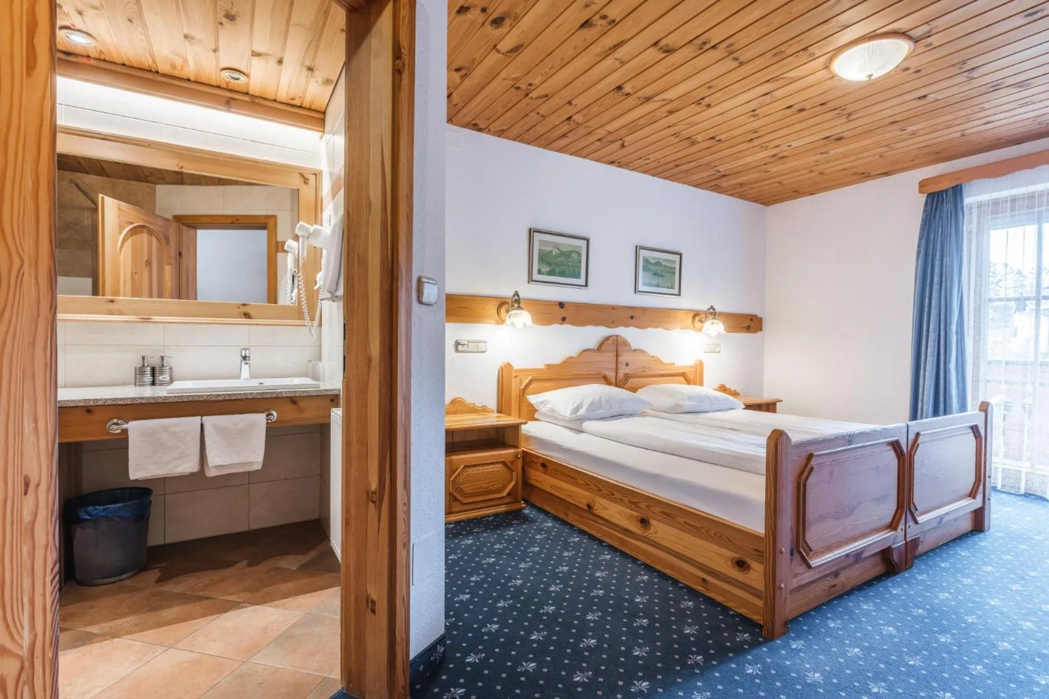 Bed in Garni Hotel Berc