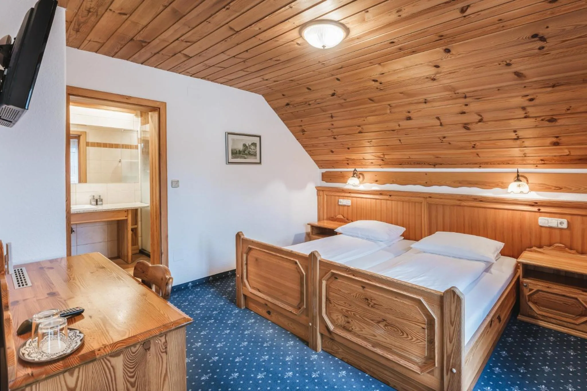 Bed in Garni Hotel Berc
