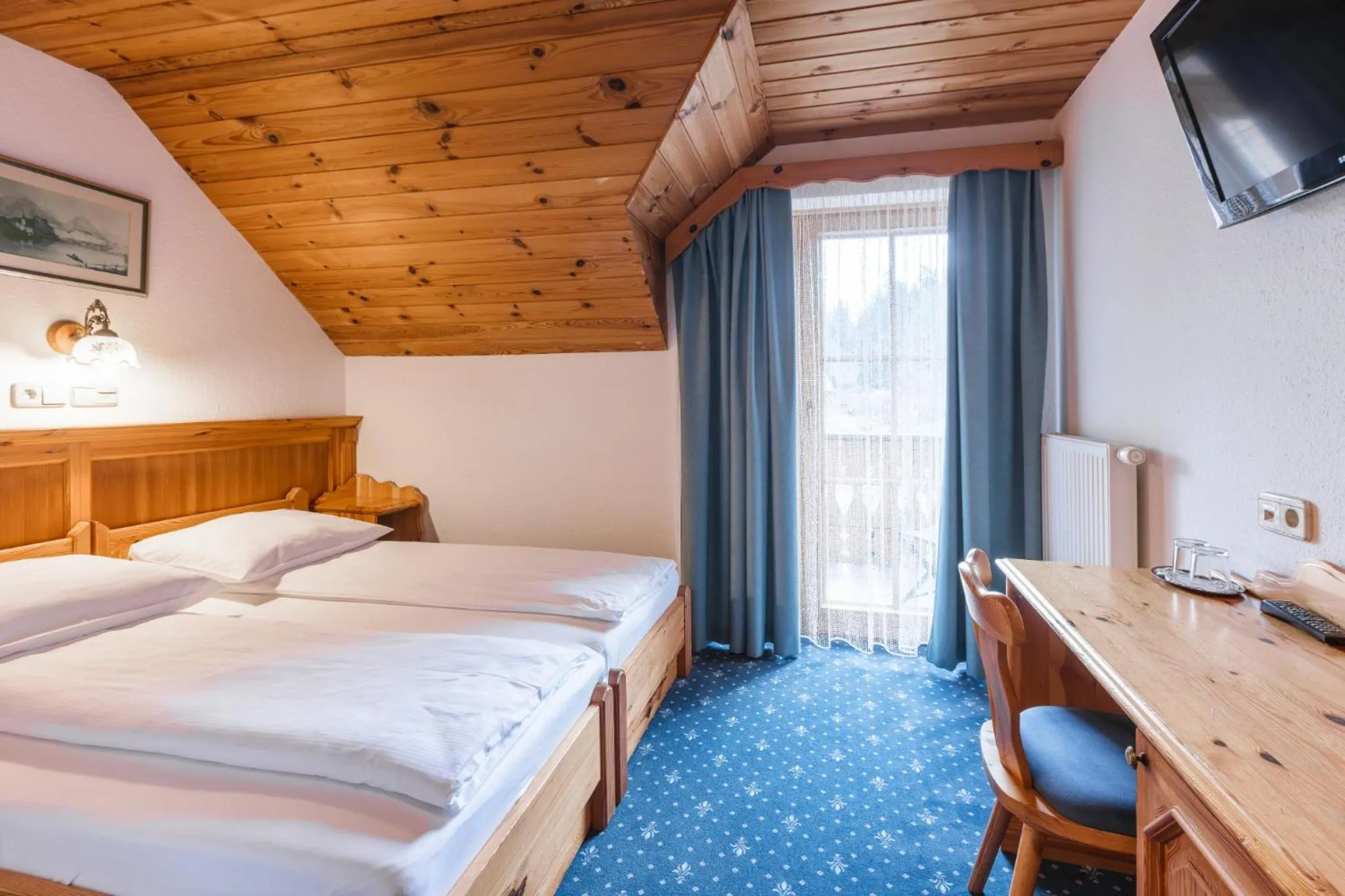 Bed in Garni Hotel Berc