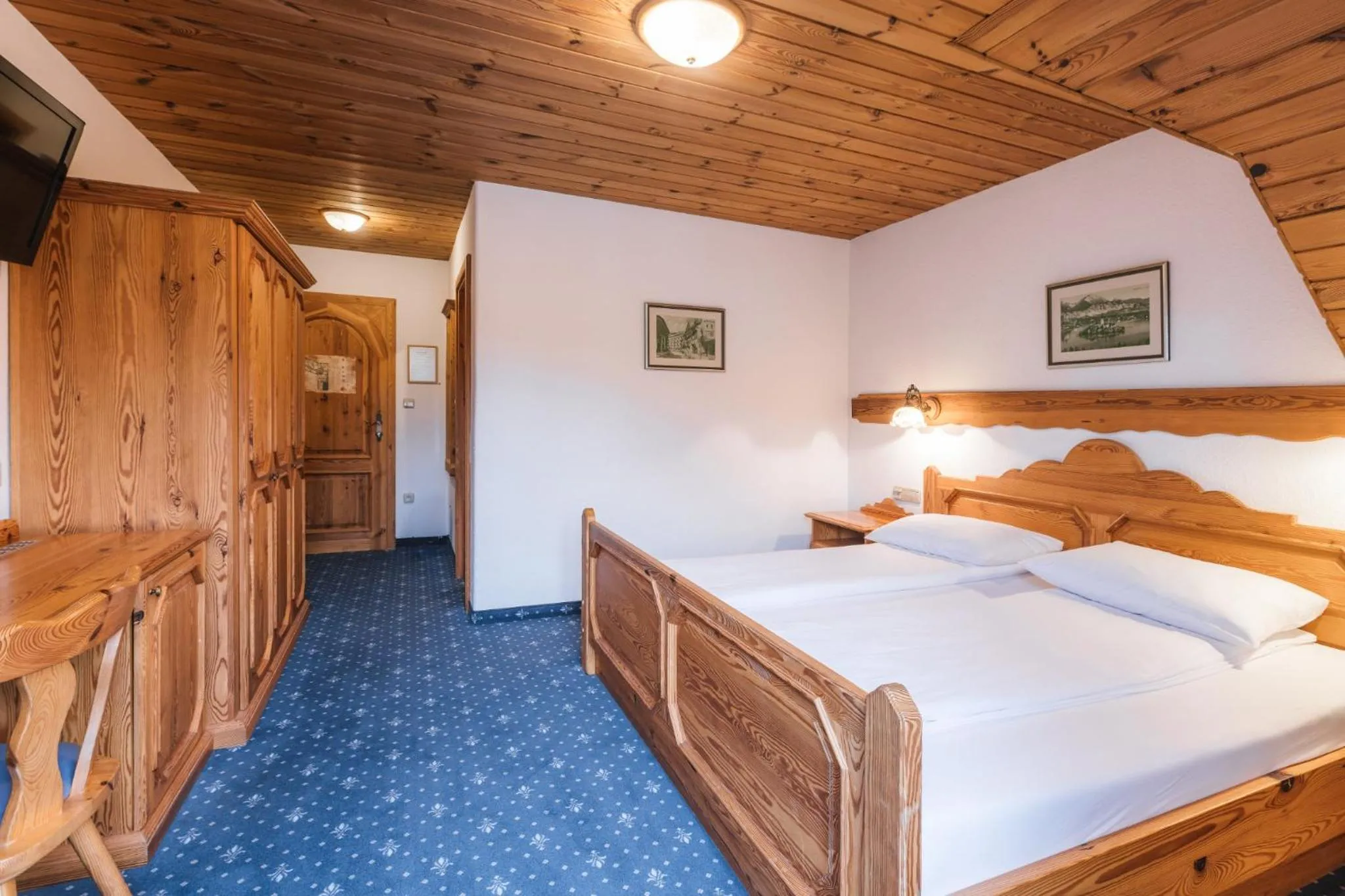 Bed in Garni Hotel Berc