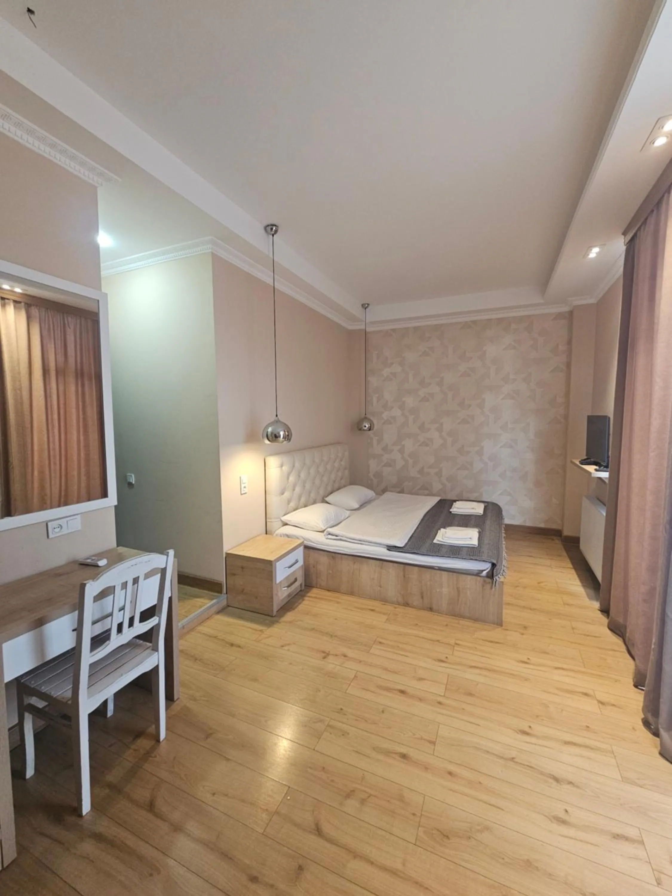 Bed in Happy Stay Hotel