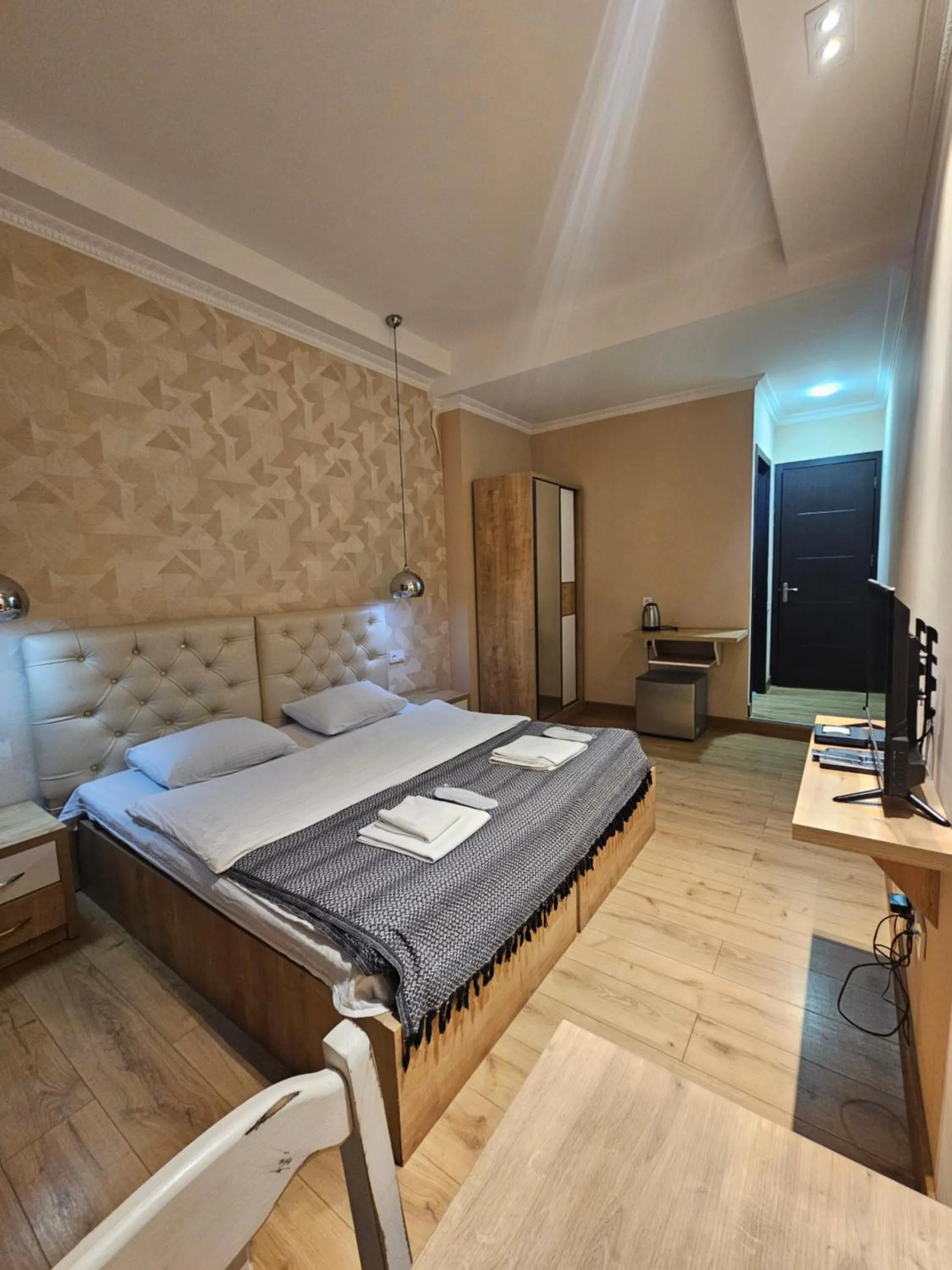 Bed in Happy Stay Hotel