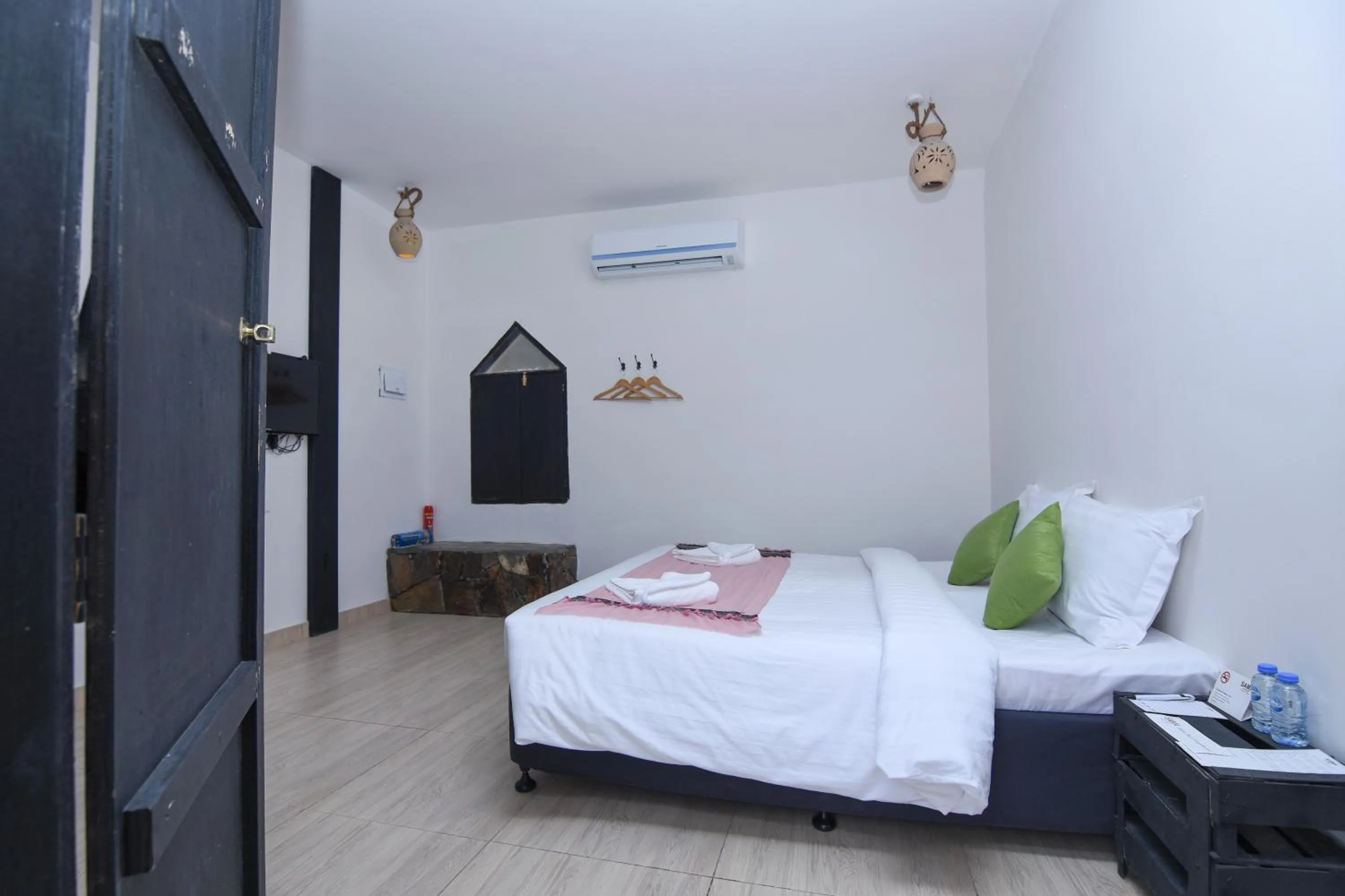 Bedroom, Bed in Sama Heights Resort