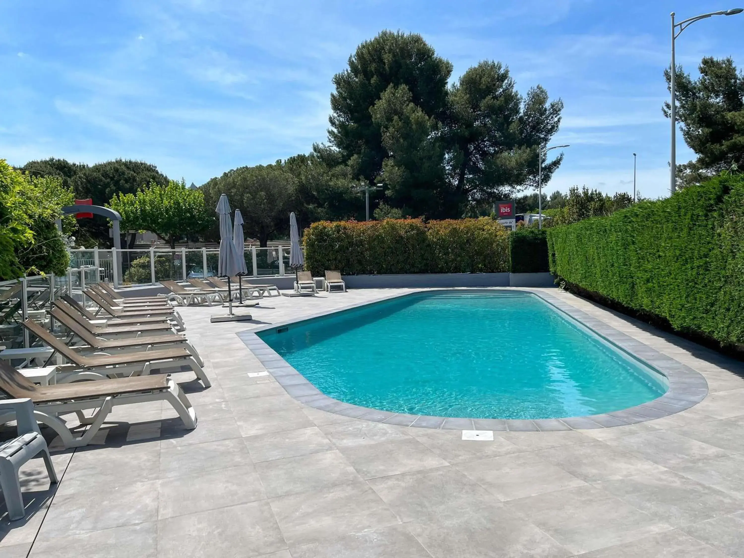 Pool view in ibis Nîmes Ouest - A9 Pool view in ibis Nîmes Ouest - A9