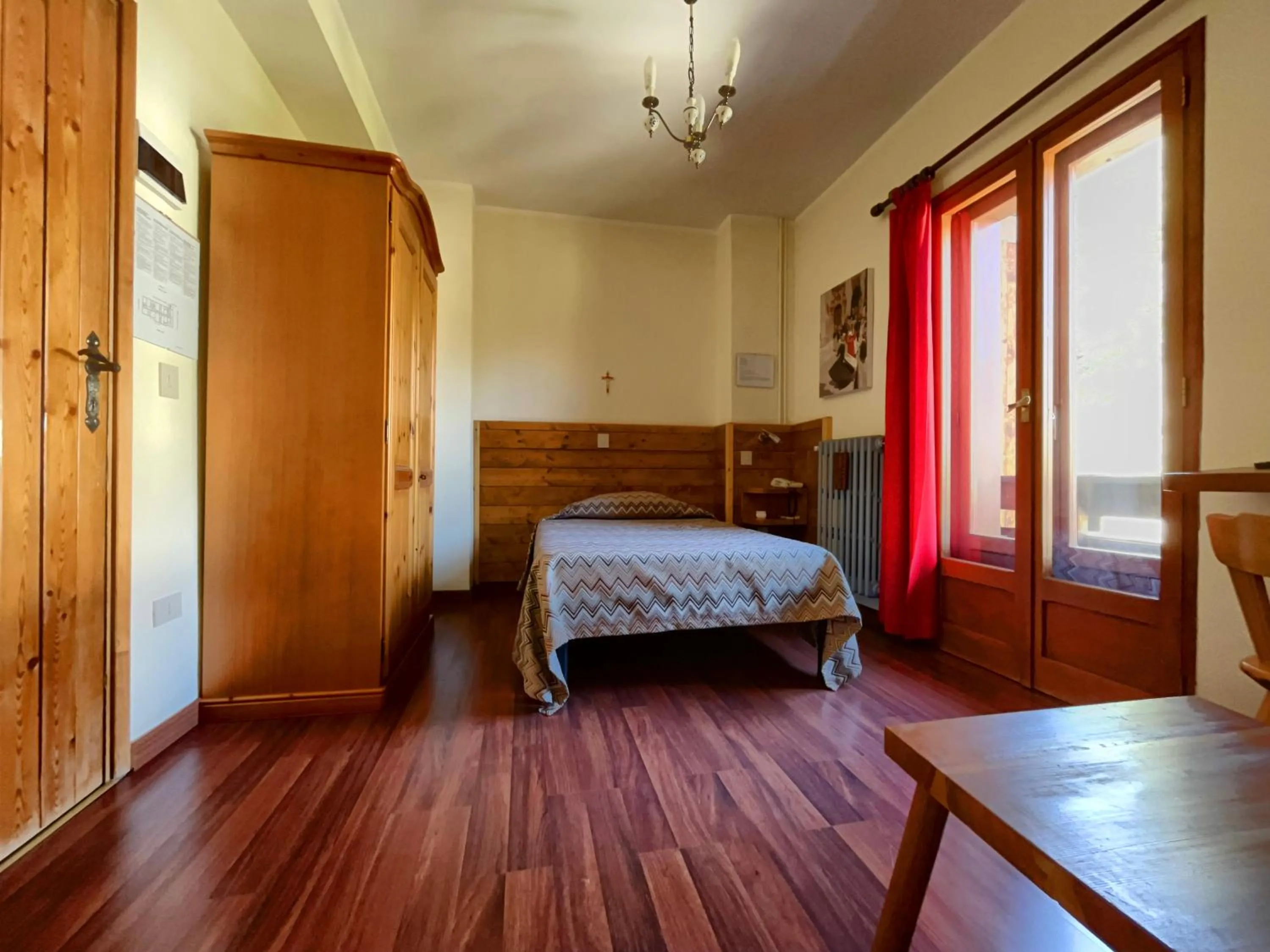 Bed in Hotel Garnì Mille Pini