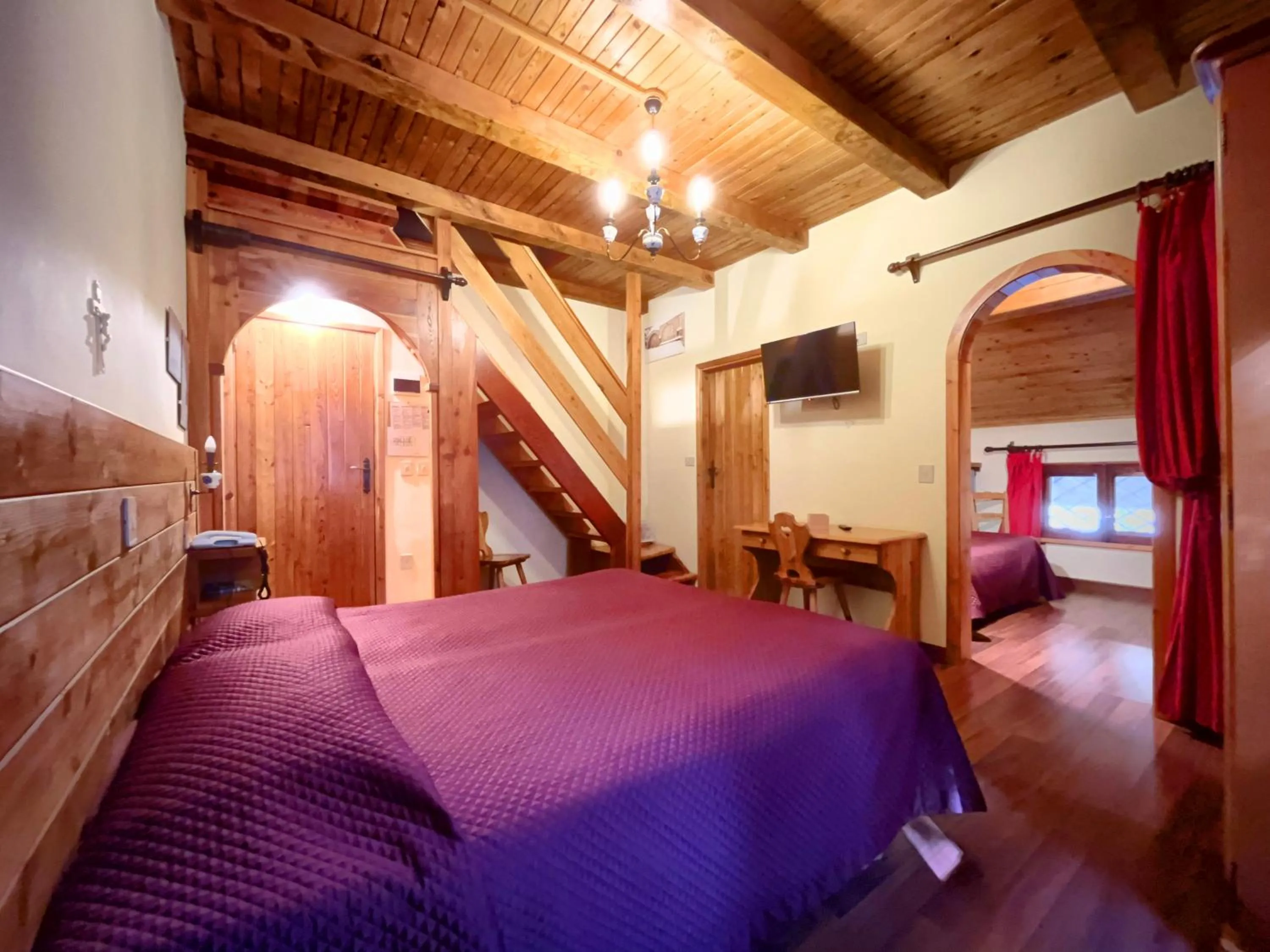 Bed in Hotel Garnì Mille Pini