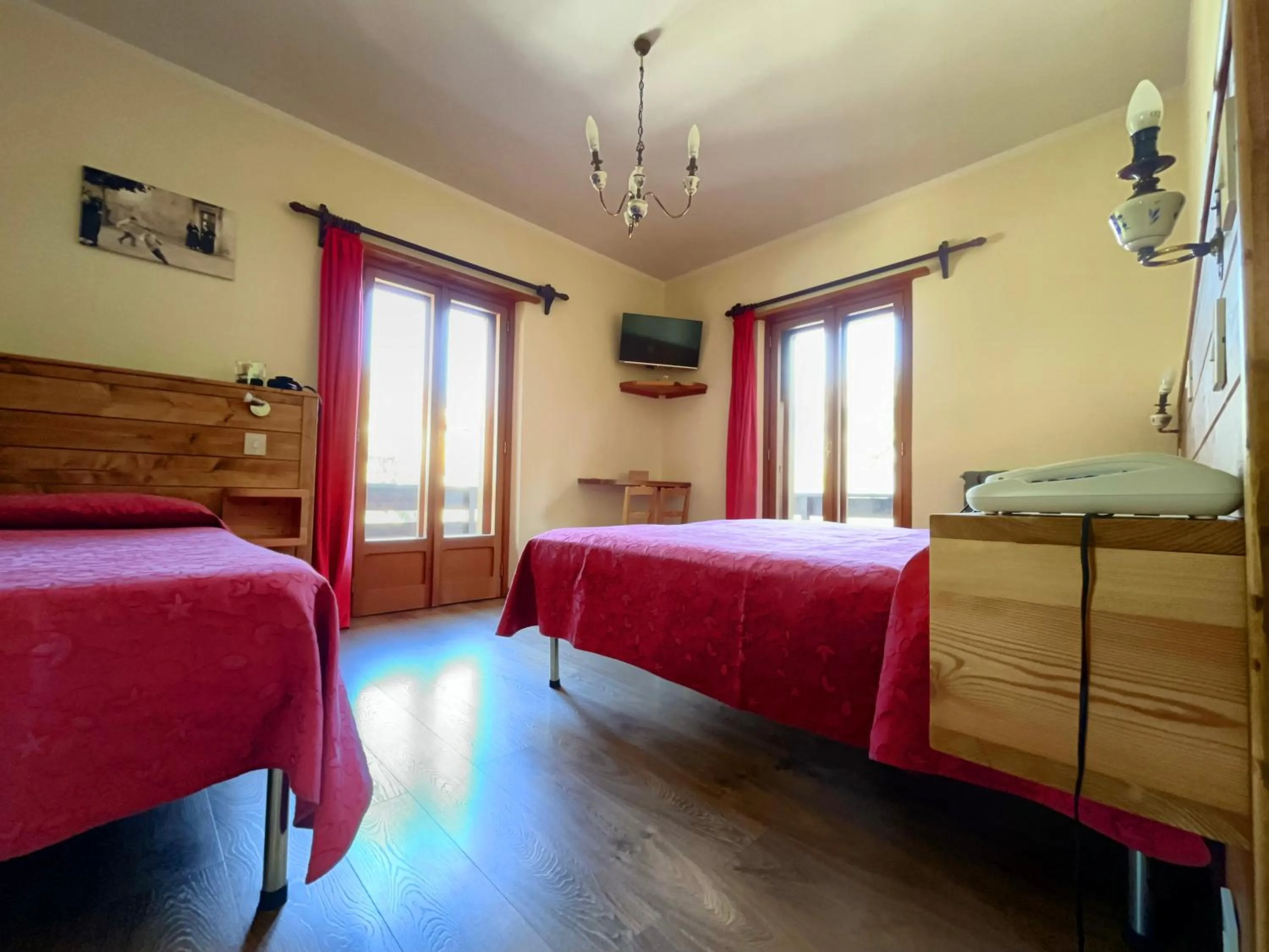 Bed in Hotel Garnì Mille Pini