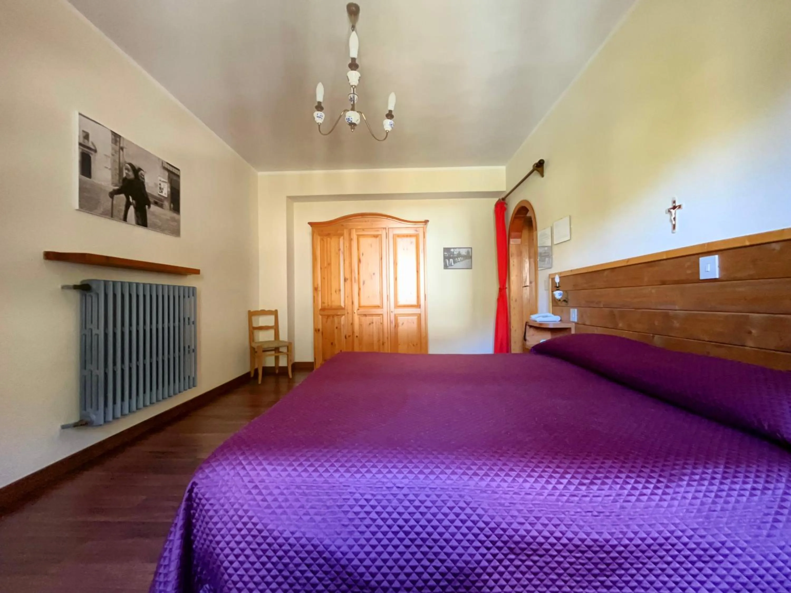 Bed in Hotel Garnì Mille Pini