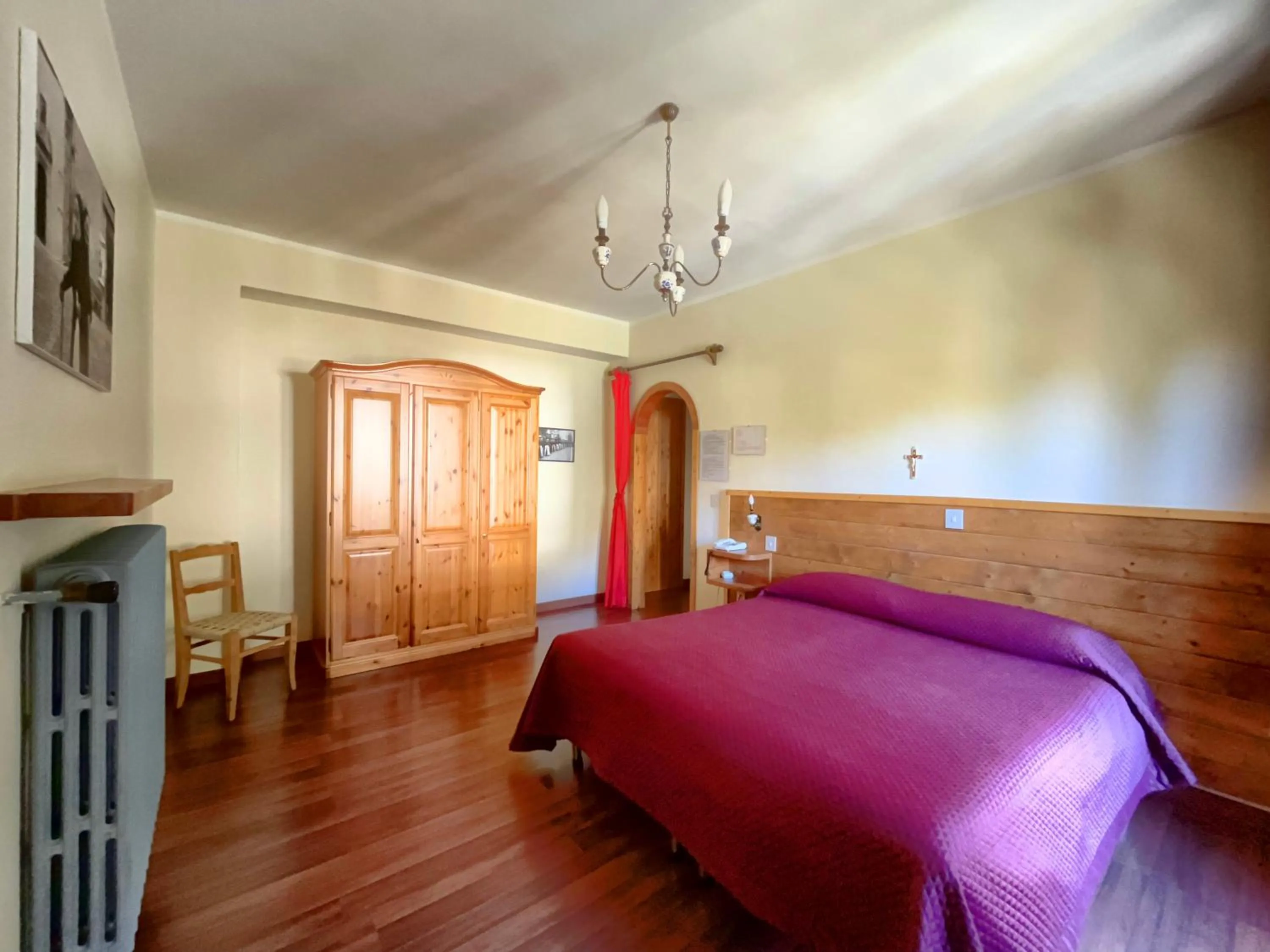 Bed in Hotel Garnì Mille Pini