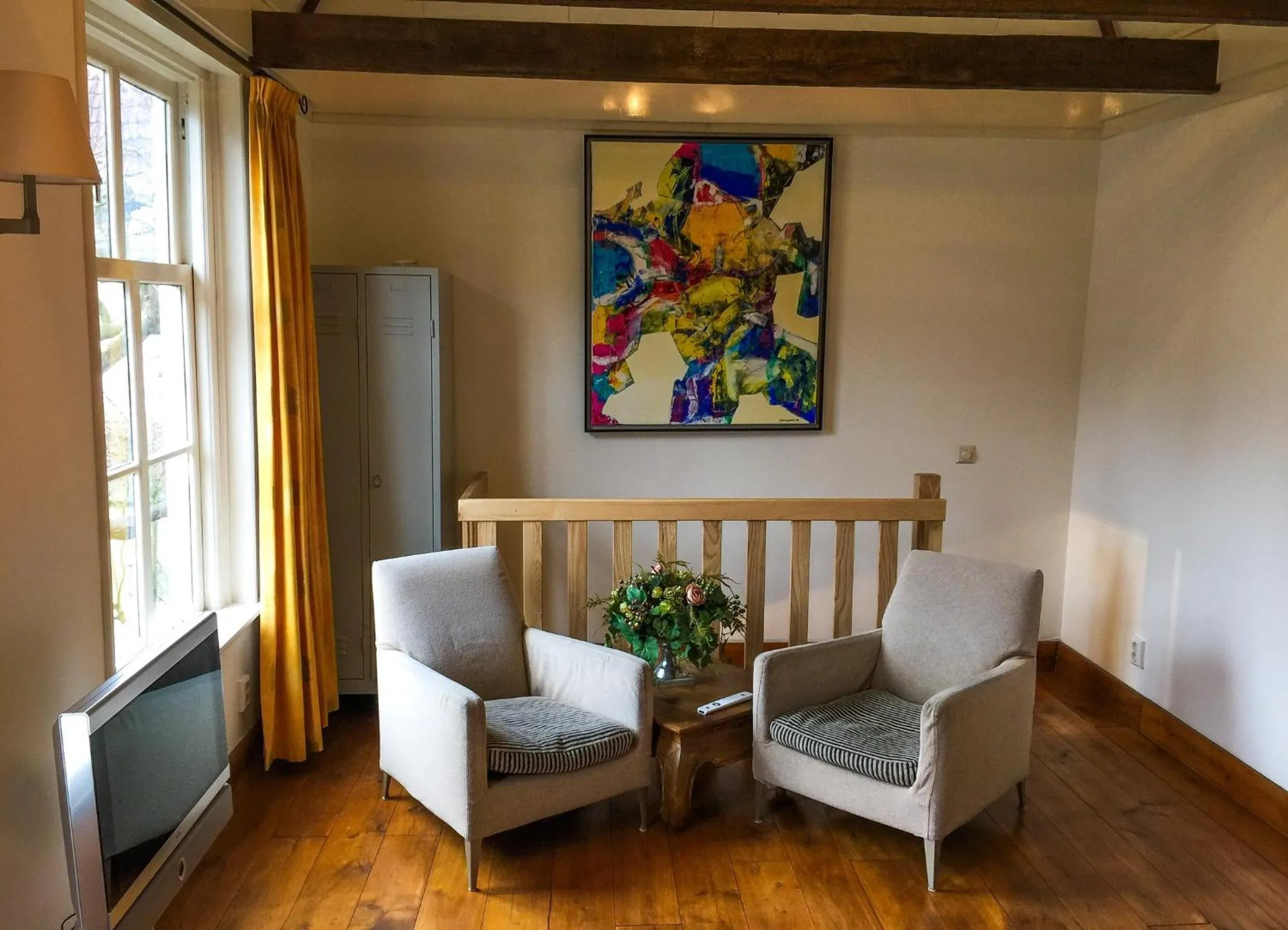 Seating area in Apple Tree Cottage - charming home at beautiful canal in our idyllic garden