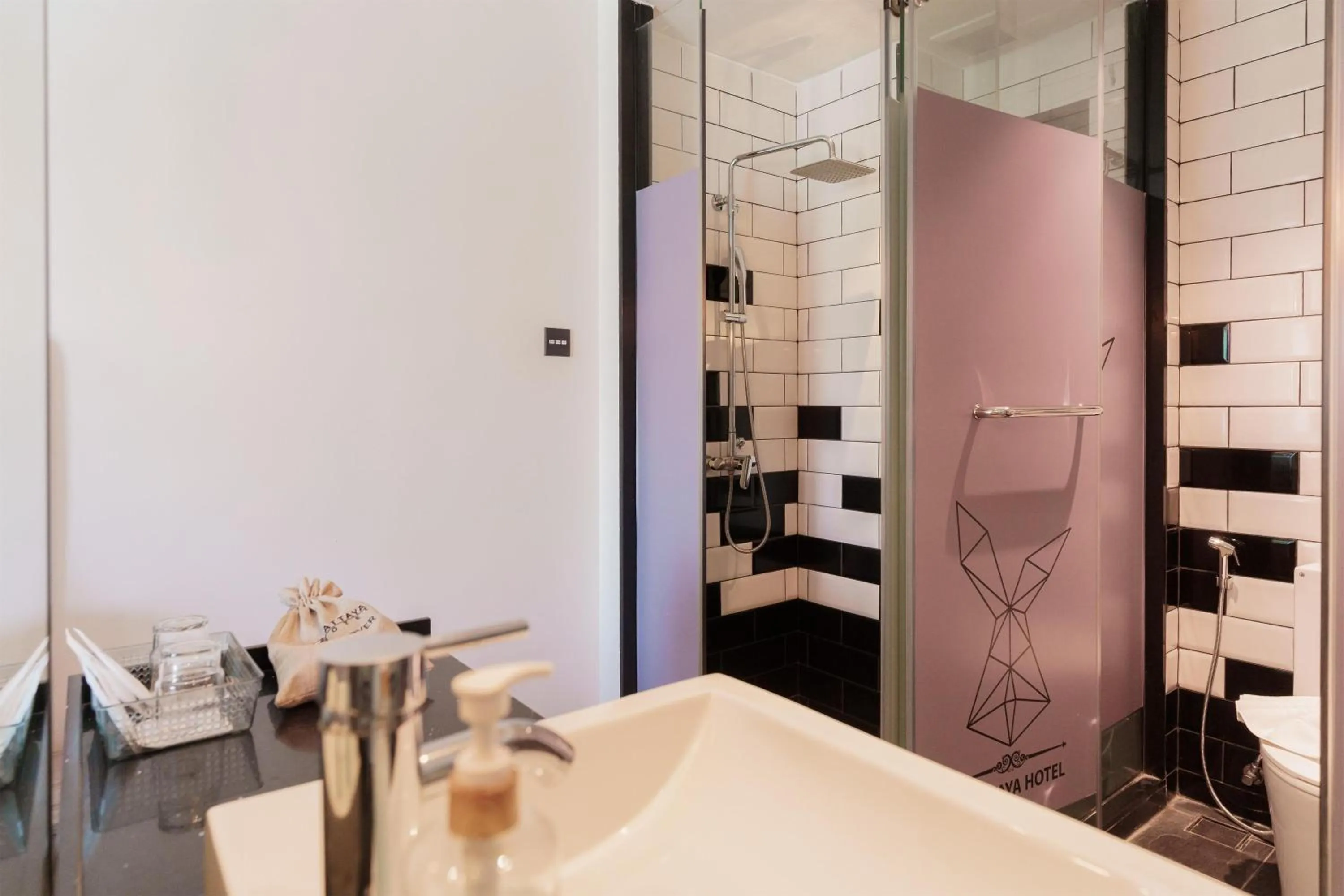 Bedroom in SureStay Plus by Best Western T Pattaya