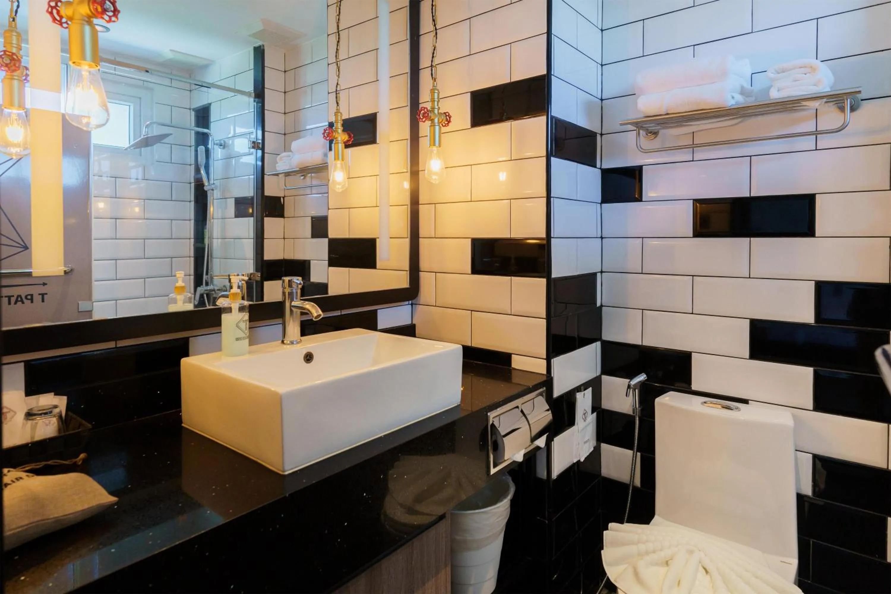 Bathroom in SureStay Plus by Best Western T Pattaya