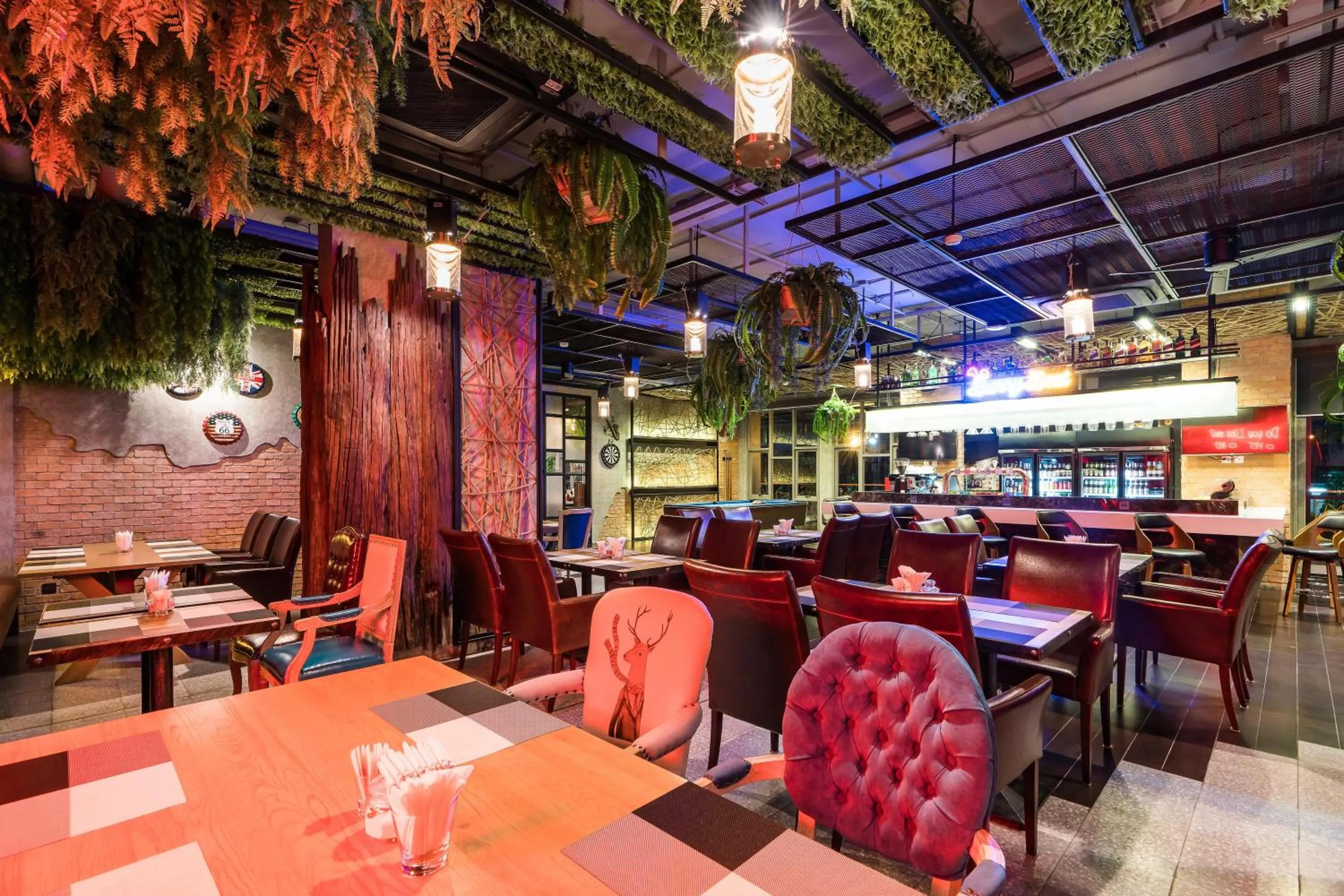 Lounge or bar in SureStay Plus by Best Western T Pattaya